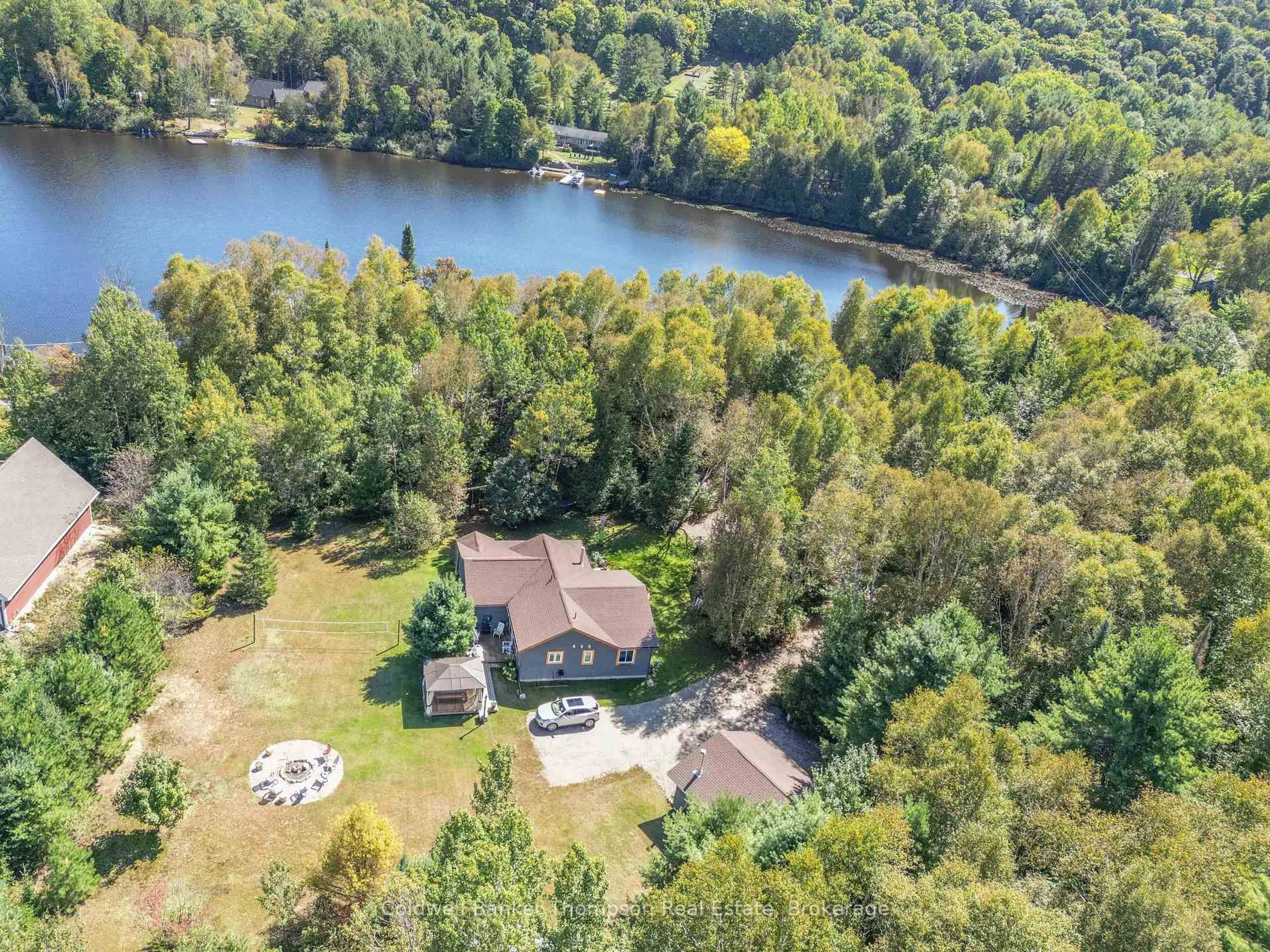 A pic from outside/outdoor area/front of a property/back of a property/a pic from drone, water/lake/river/ocean view for 1078 Bellwood Acres Rd, Lake of Bays Ontario P0A 1E0