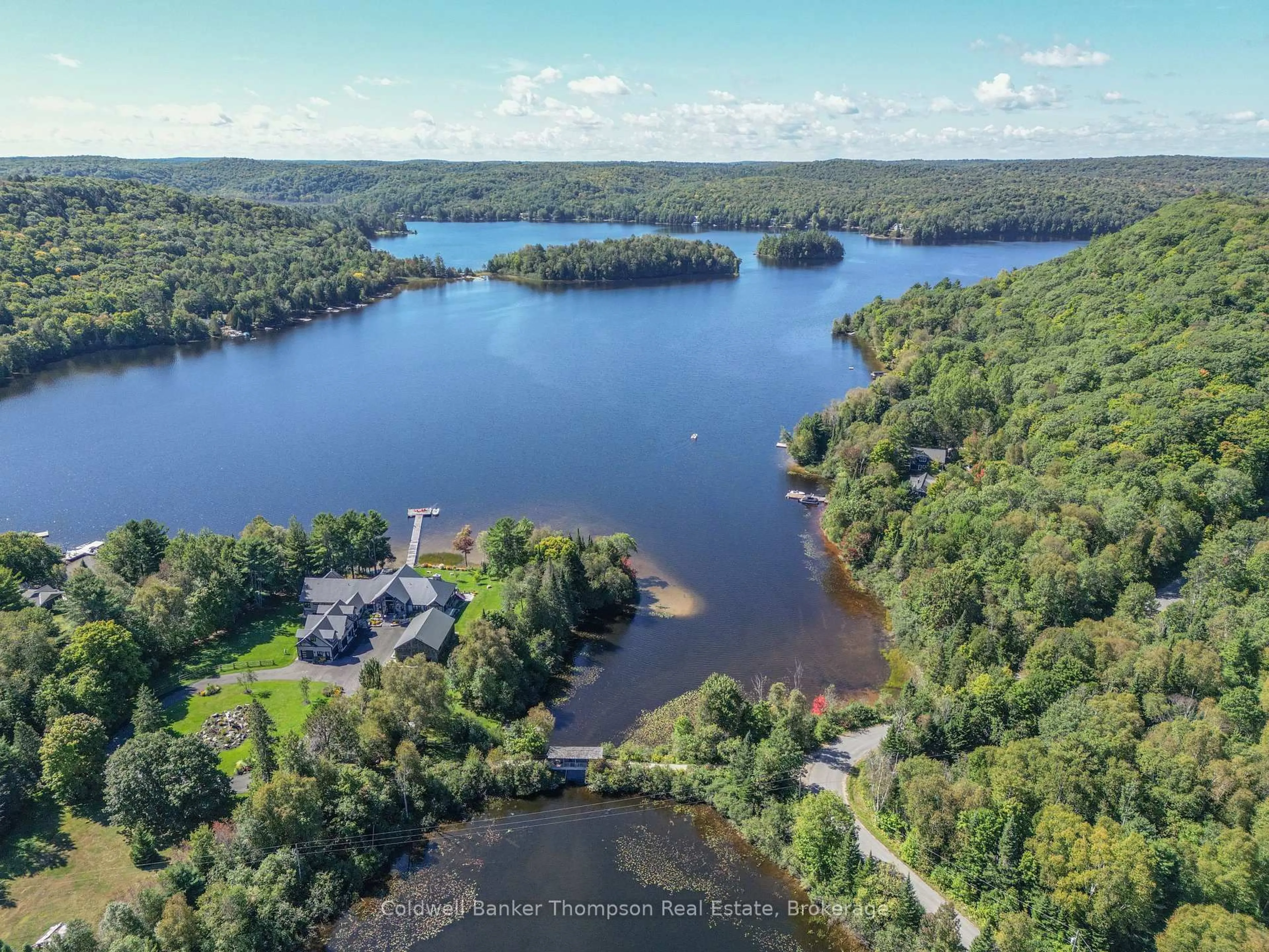 A pic from outside/outdoor area/front of a property/back of a property/a pic from drone, water/lake/river/ocean view for 1078 Bellwood Acres Rd, Lake of Bays Ontario P0A 1E0