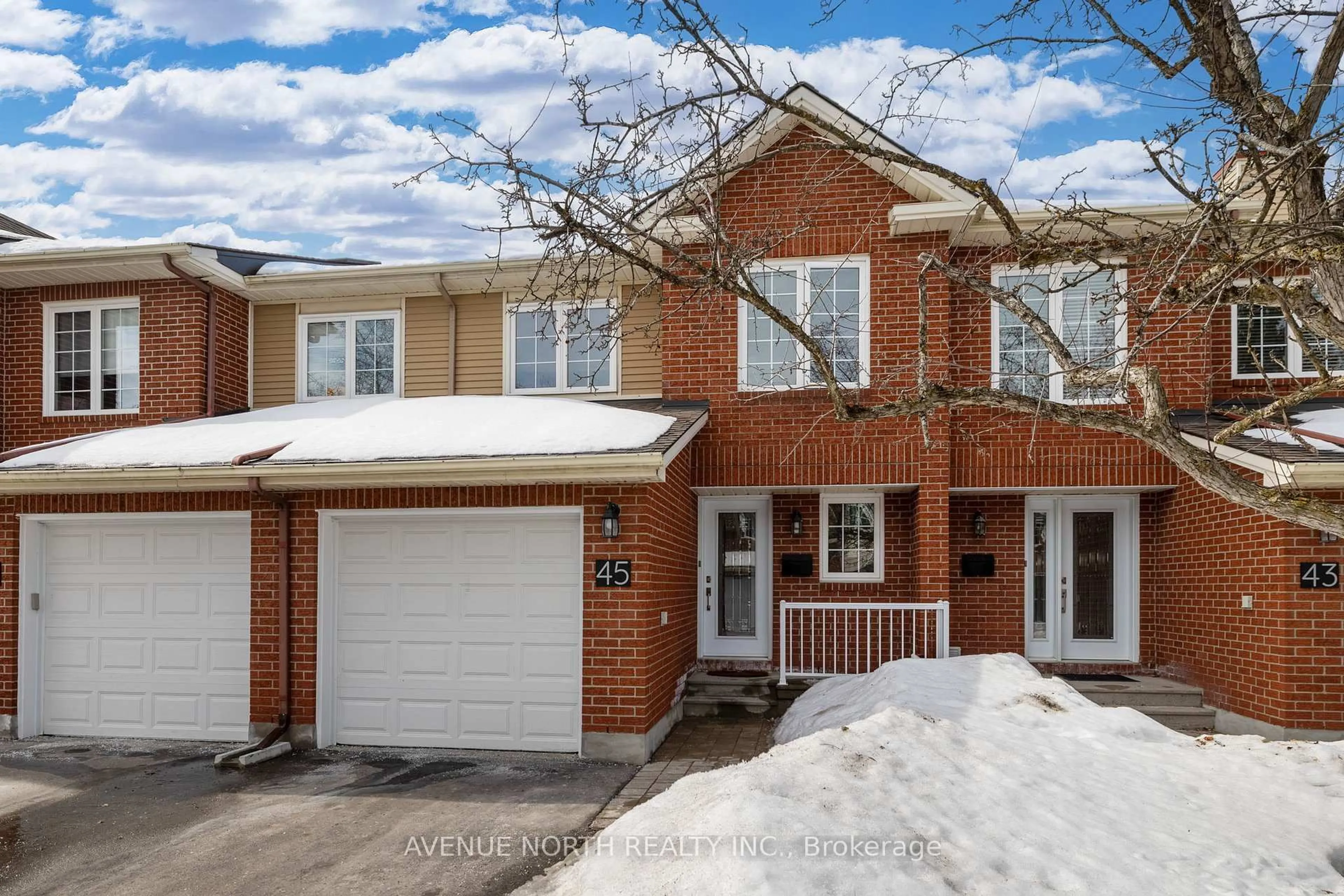 Home with brick exterior material, street for 45 Wrenwood Cres, Ottawa Ontario K2G 5V4