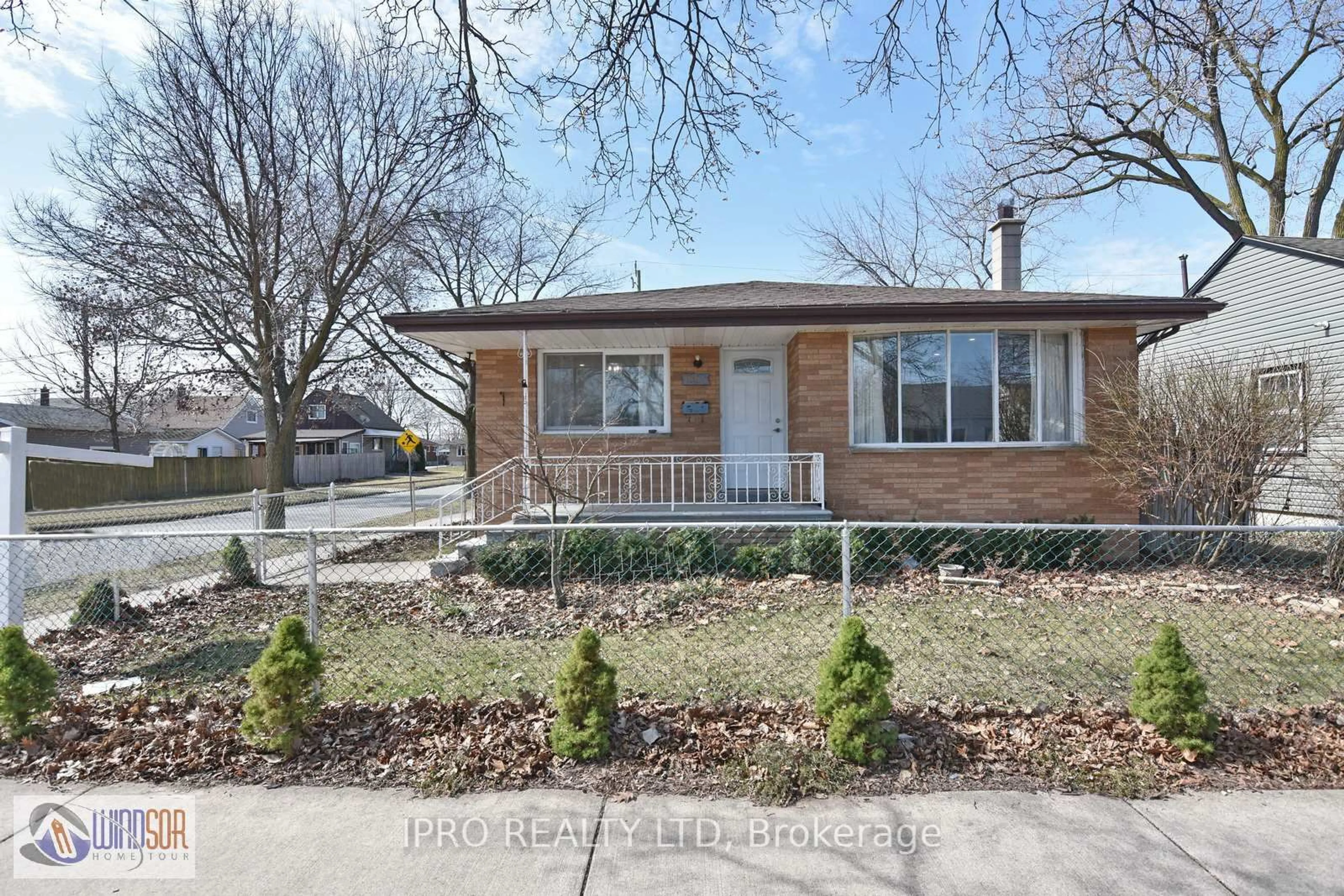 Home with brick exterior material, street for 1697 Westcott Rd, Windsor Ontario N8Y 4C8