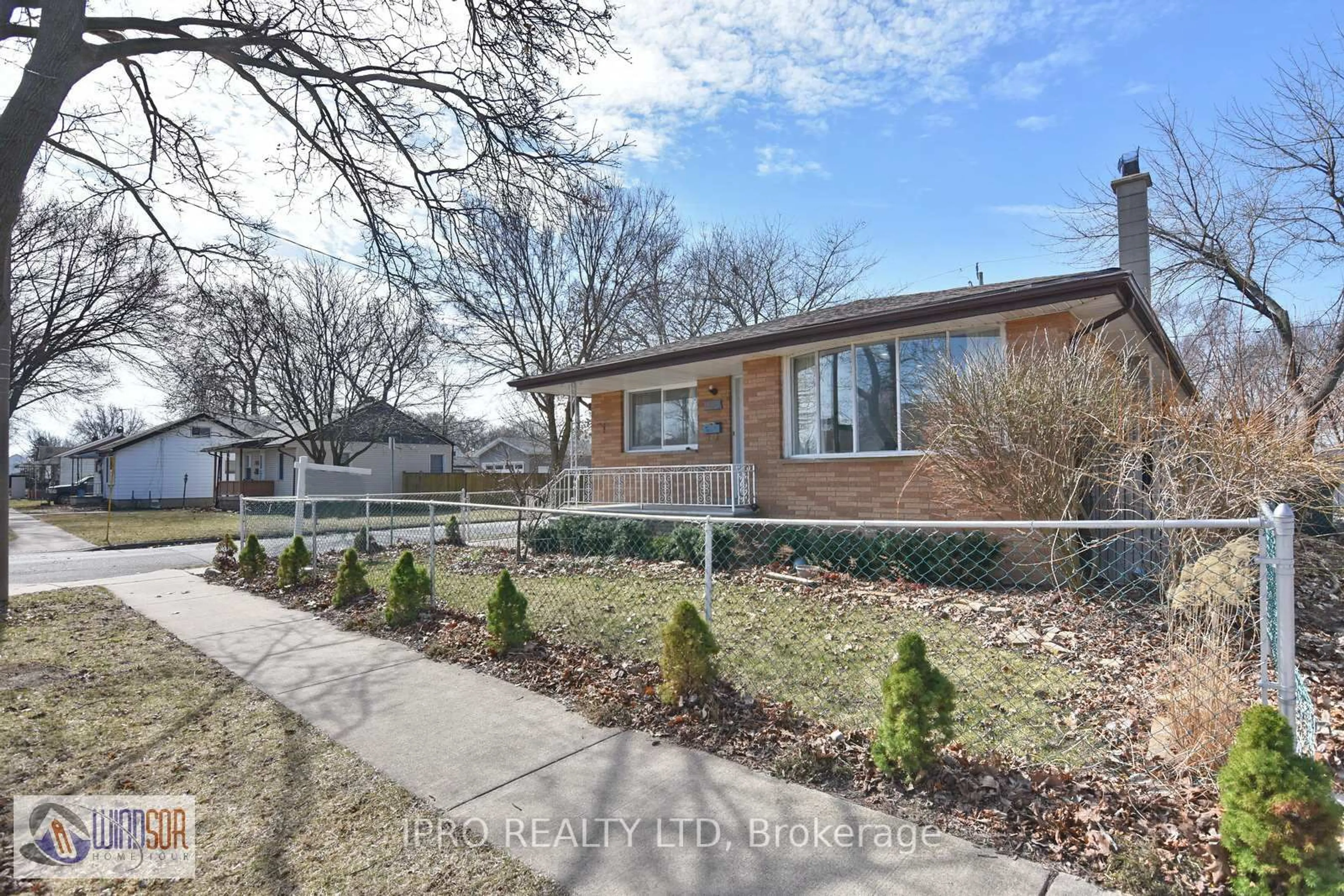 Home with brick exterior material, street for 1697 Westcott Rd, Windsor Ontario N8Y 4C8