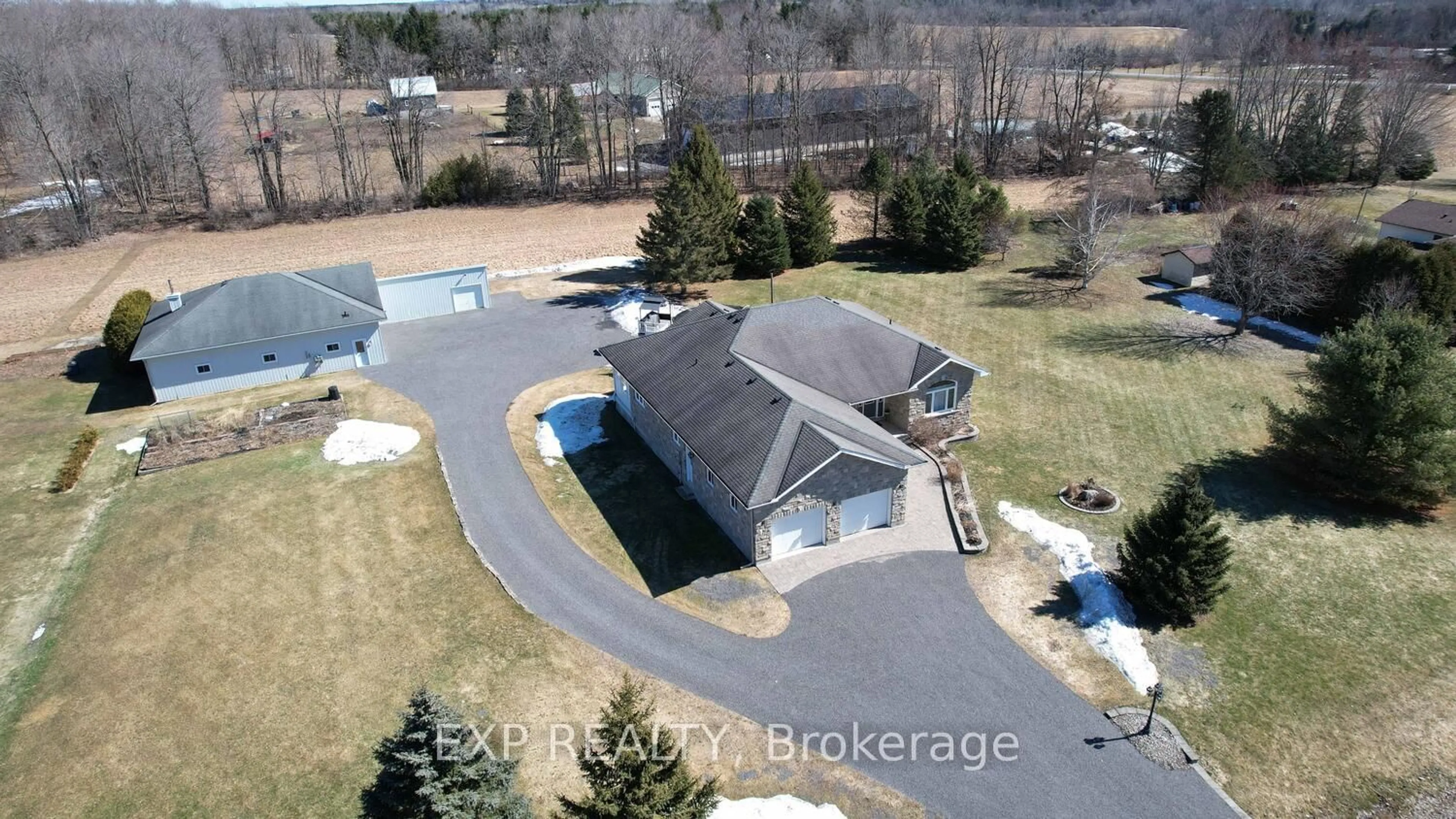 A pic from outside/outdoor area/front of a property/back of a property/a pic from drone, street for 415 Johnston Rd, North Grenville Ontario K0G 1J0