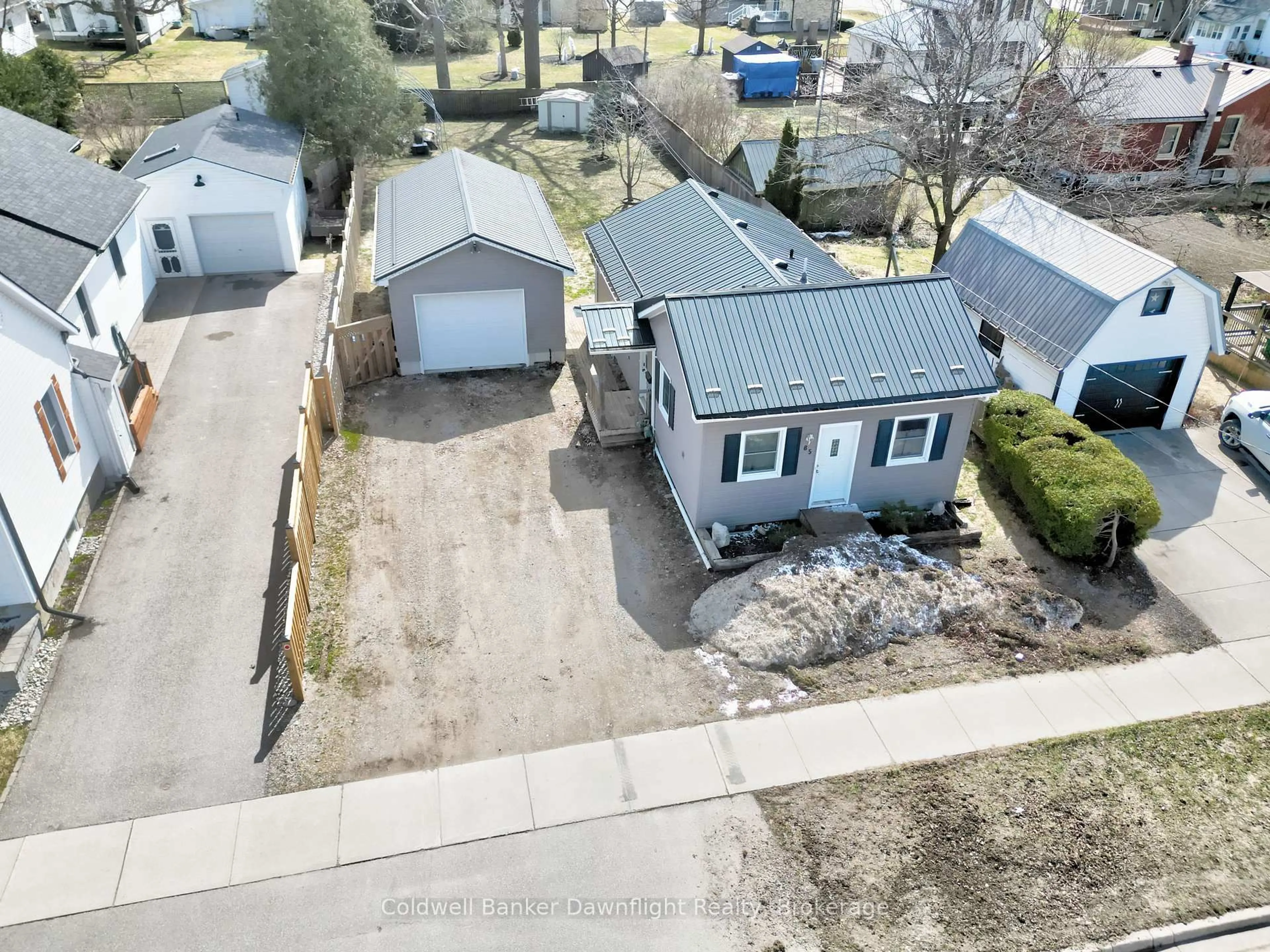 A pic from outside/outdoor area/front of a property/back of a property/a pic from drone, street for 85 Huron St, South Huron Ontario N0M 1S2