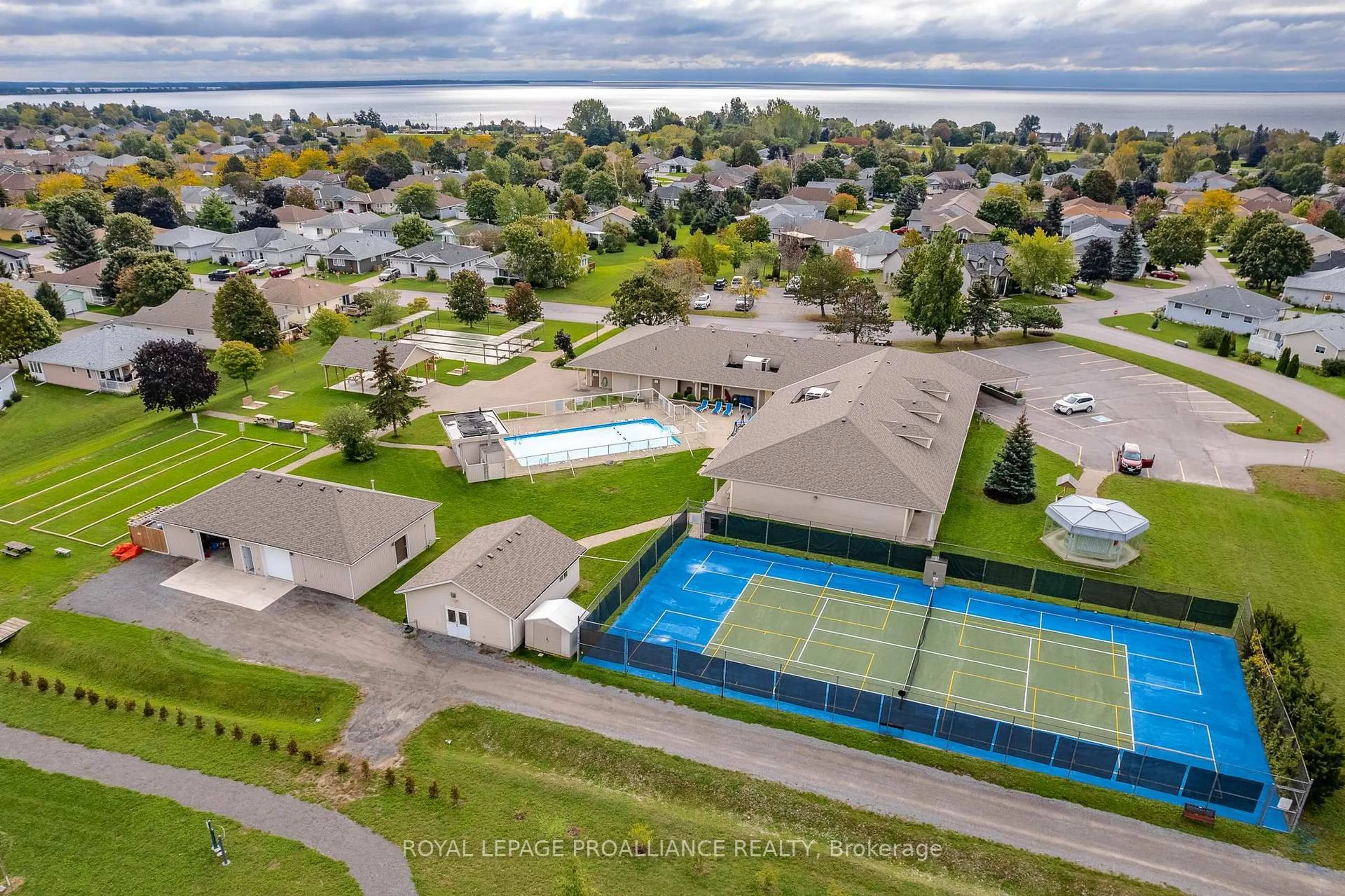 A pic from outside/outdoor area/front of a property/back of a property/a pic from drone, water/lake/river/ocean view for 5 Conger Dr, Prince Edward County Ontario K0K 3L0