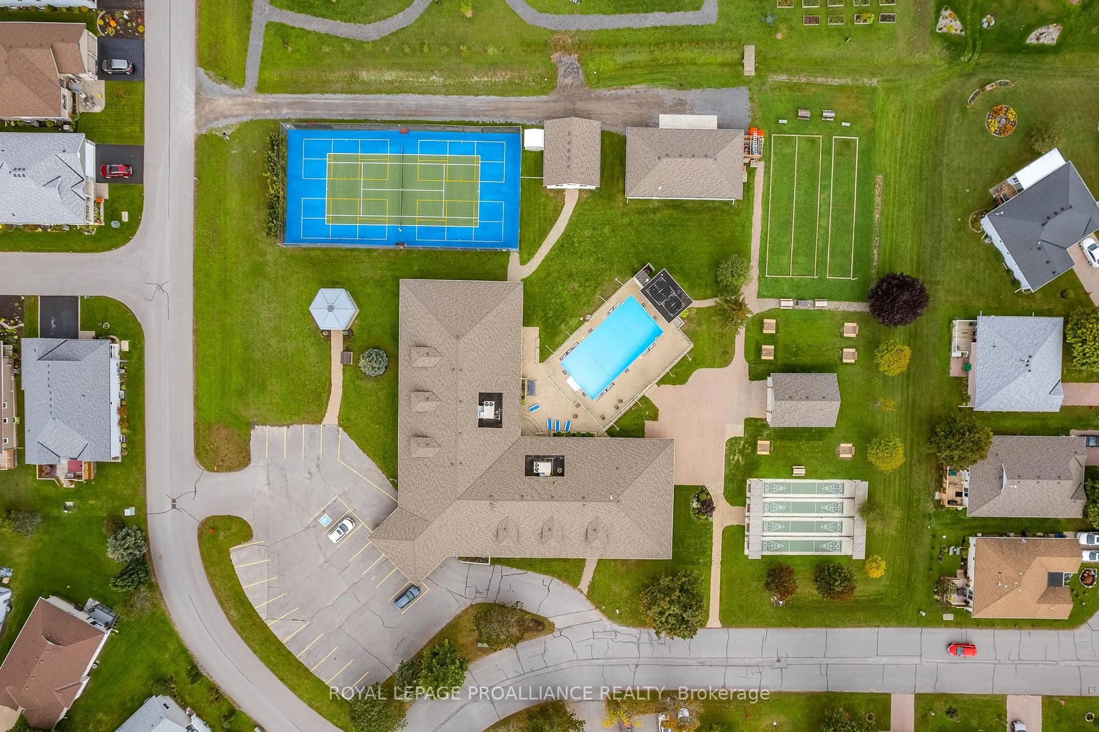 A pic from outside/outdoor area/front of a property/back of a property/a pic from drone, street for 5 Conger Dr, Prince Edward County Ontario K0K 3L0