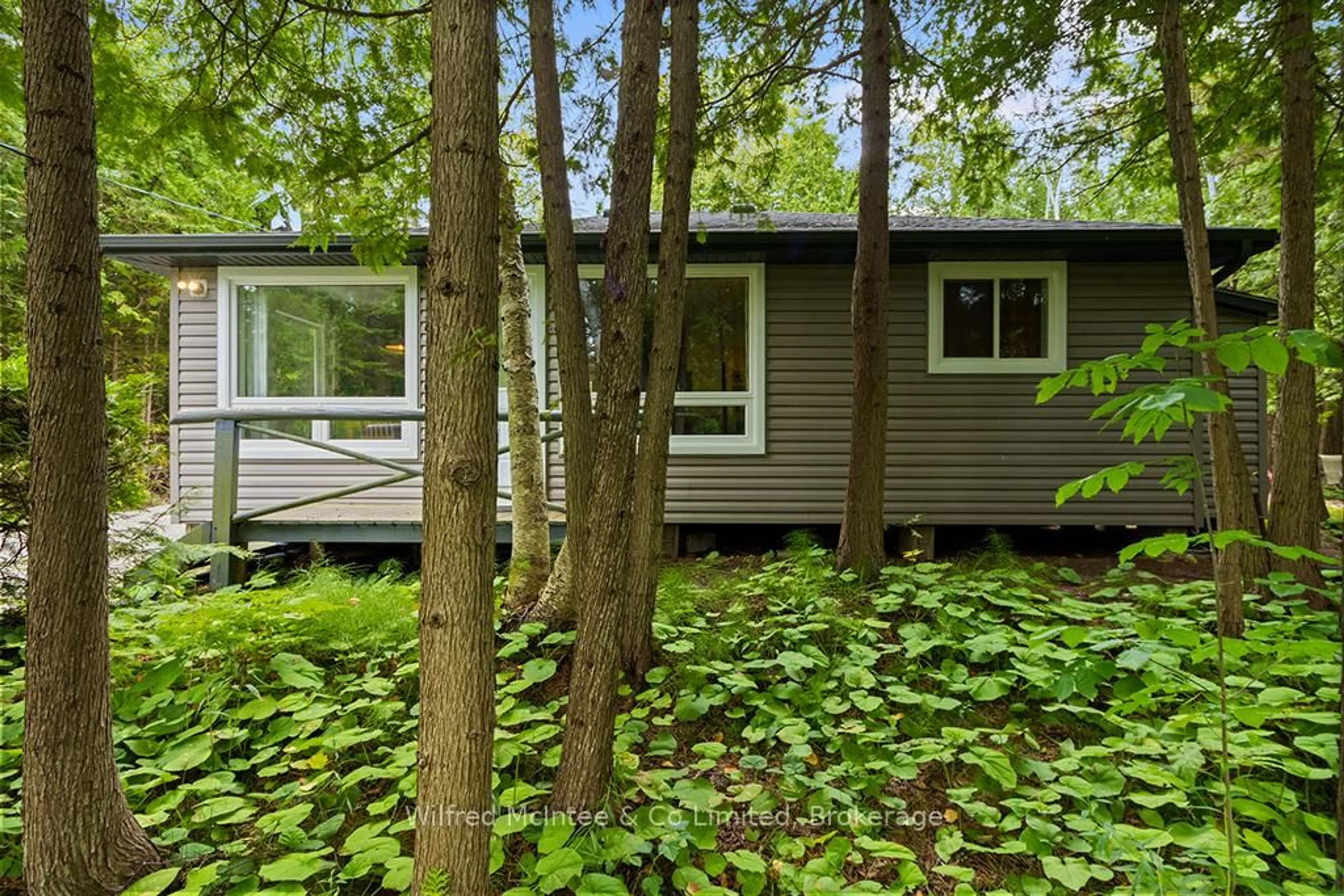 Home with vinyl exterior material, forest/trees view for 1489 2ND Ave, Native Leased Lands Ontario N0H 2G0