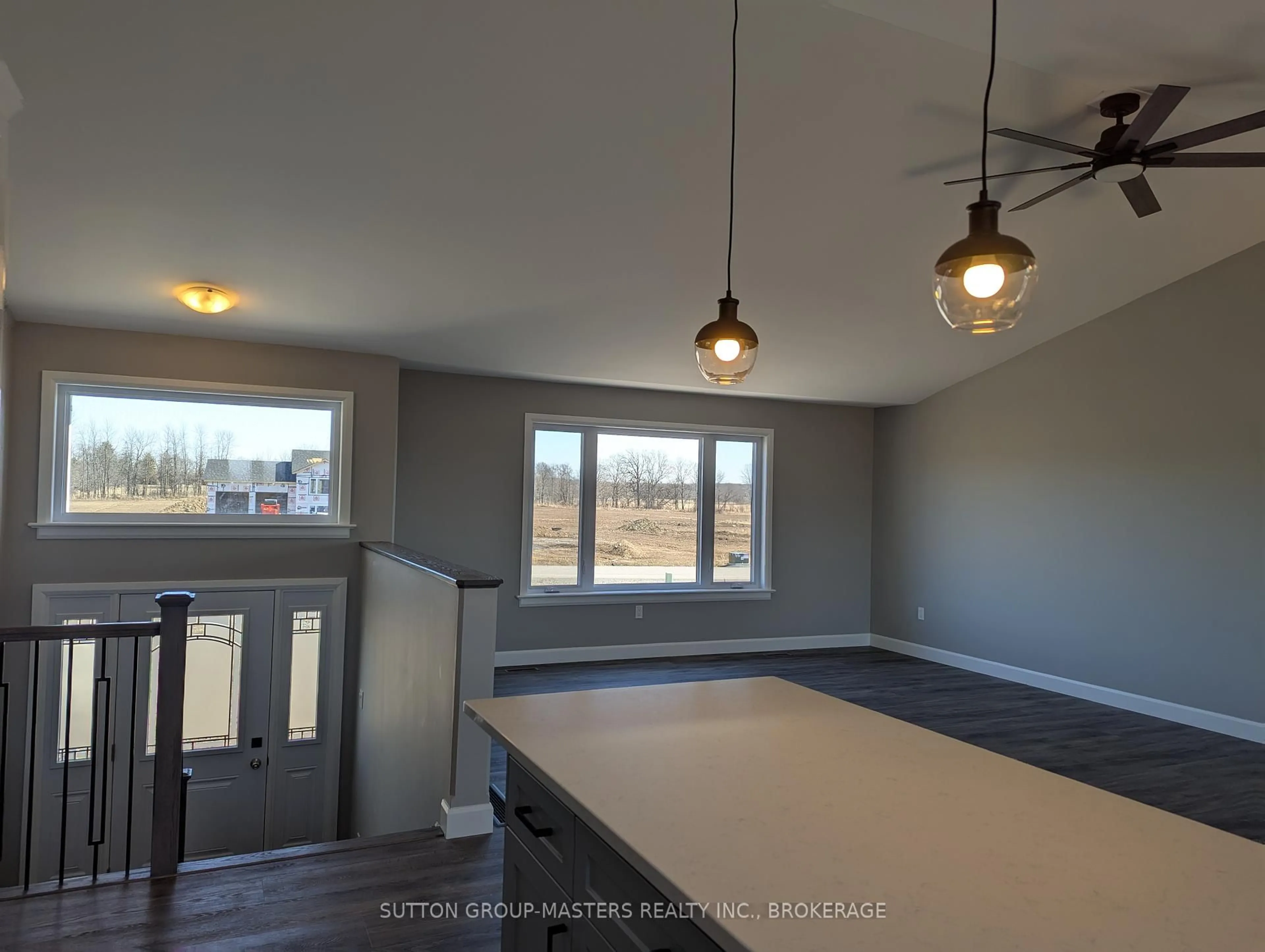 Open concept kitchen, cement floor for 107 Bittersweet Rd, Hartington Ontario K0H 1W0