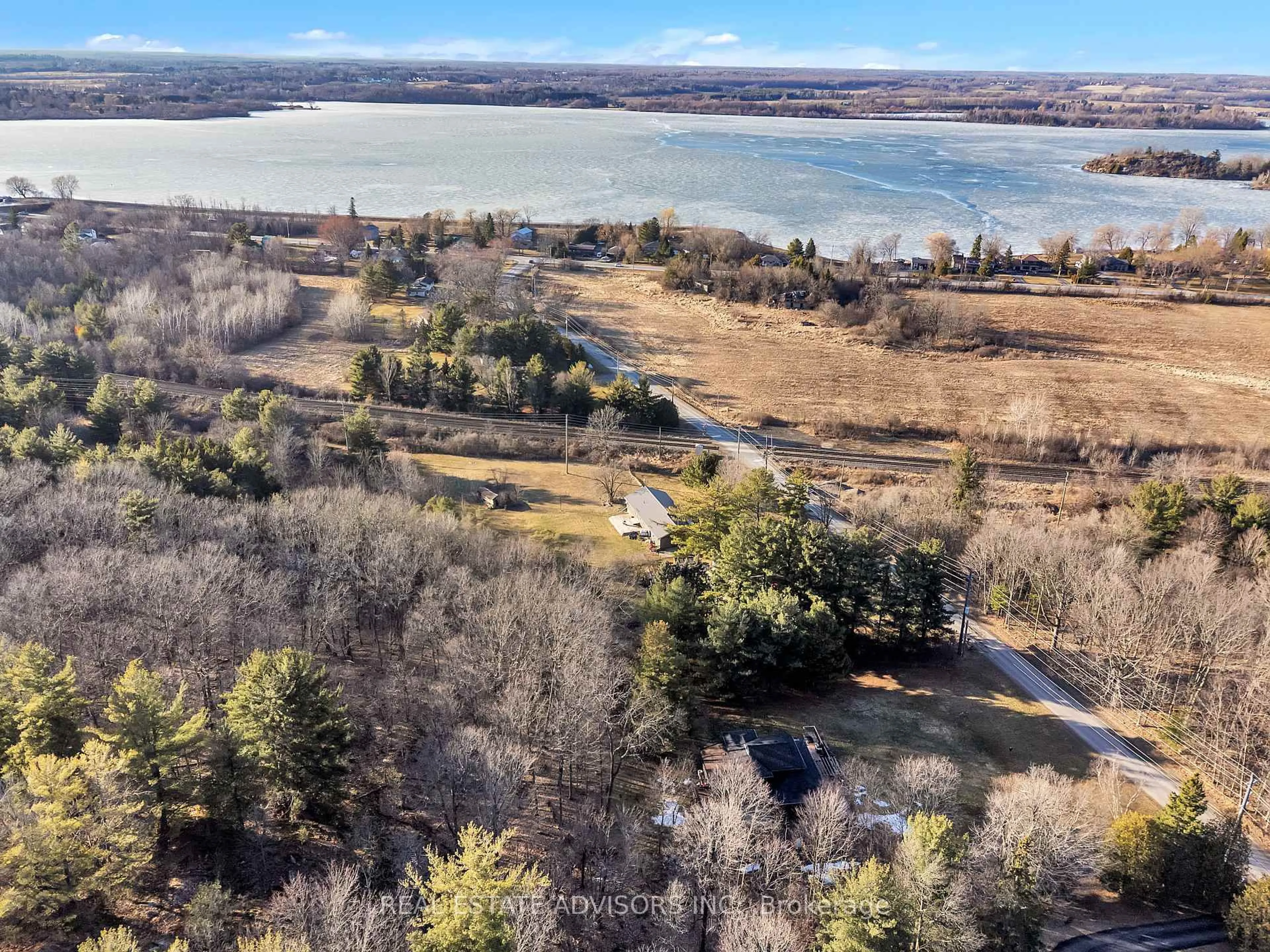 A pic from outside/outdoor area/front of a property/back of a property/a pic from drone, water/lake/river/ocean view for 1633 Station Rd, Kingston Ontario K7L 5H6