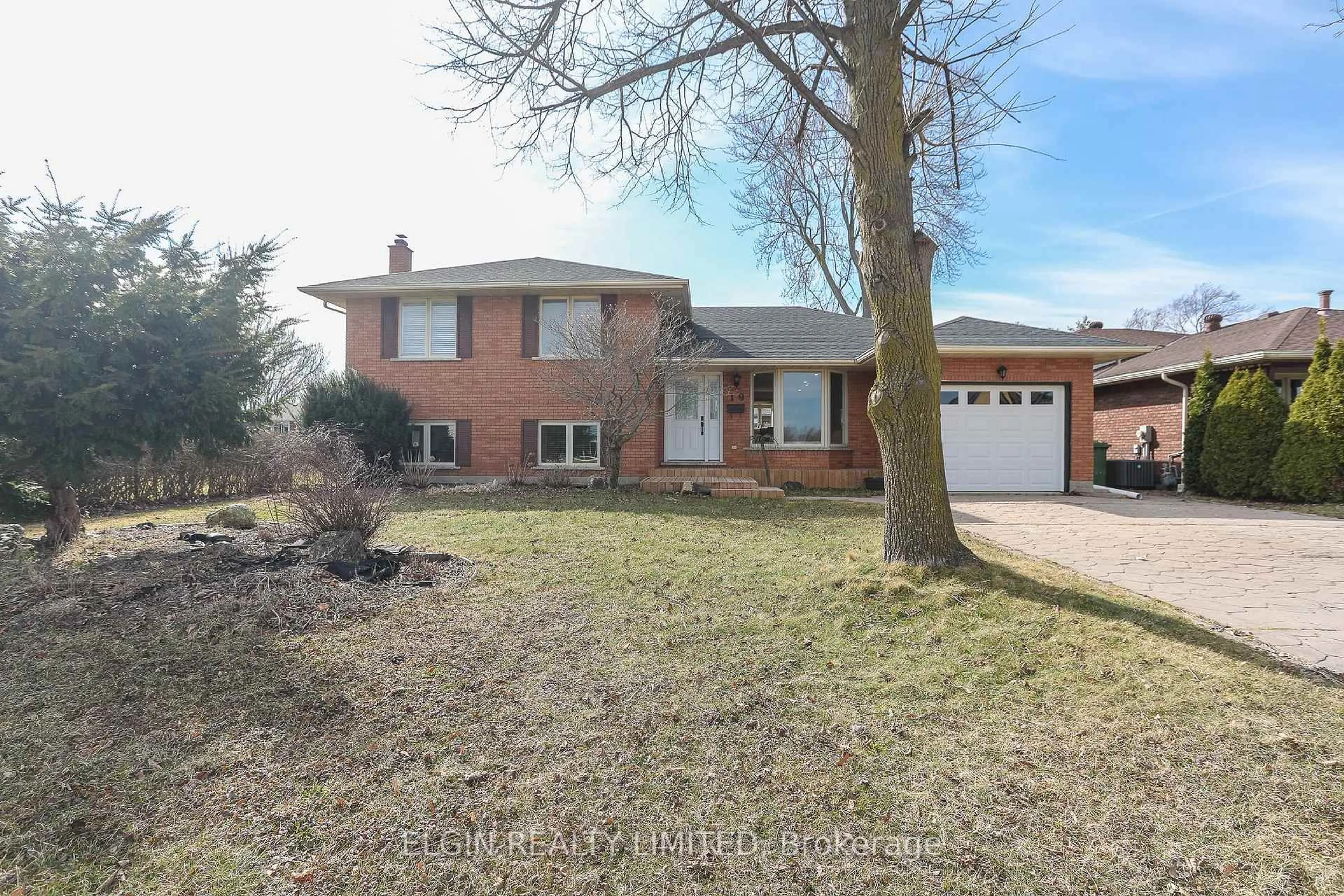 Home with brick exterior material, street for 19 High St, St. Thomas Ontario N5R 5R6