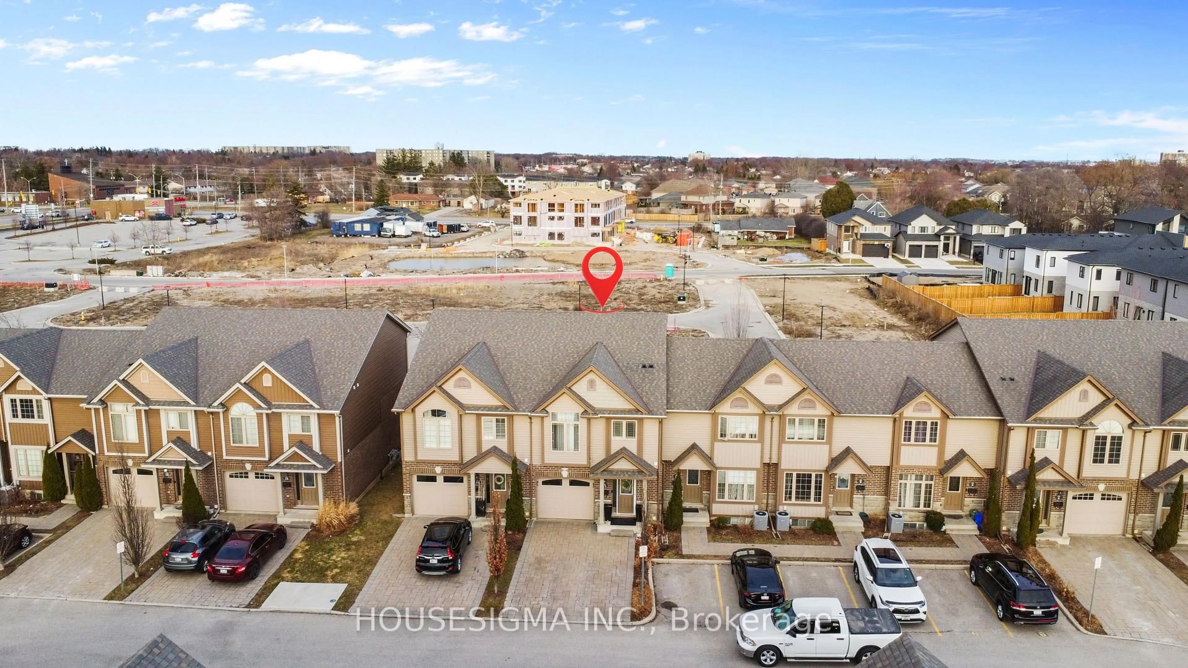 A pic from outside/outdoor area/front of a property/back of a property/a pic from drone, street for 2635 Bateman Tr #Unit 12, London South Ontario N6L 0C1