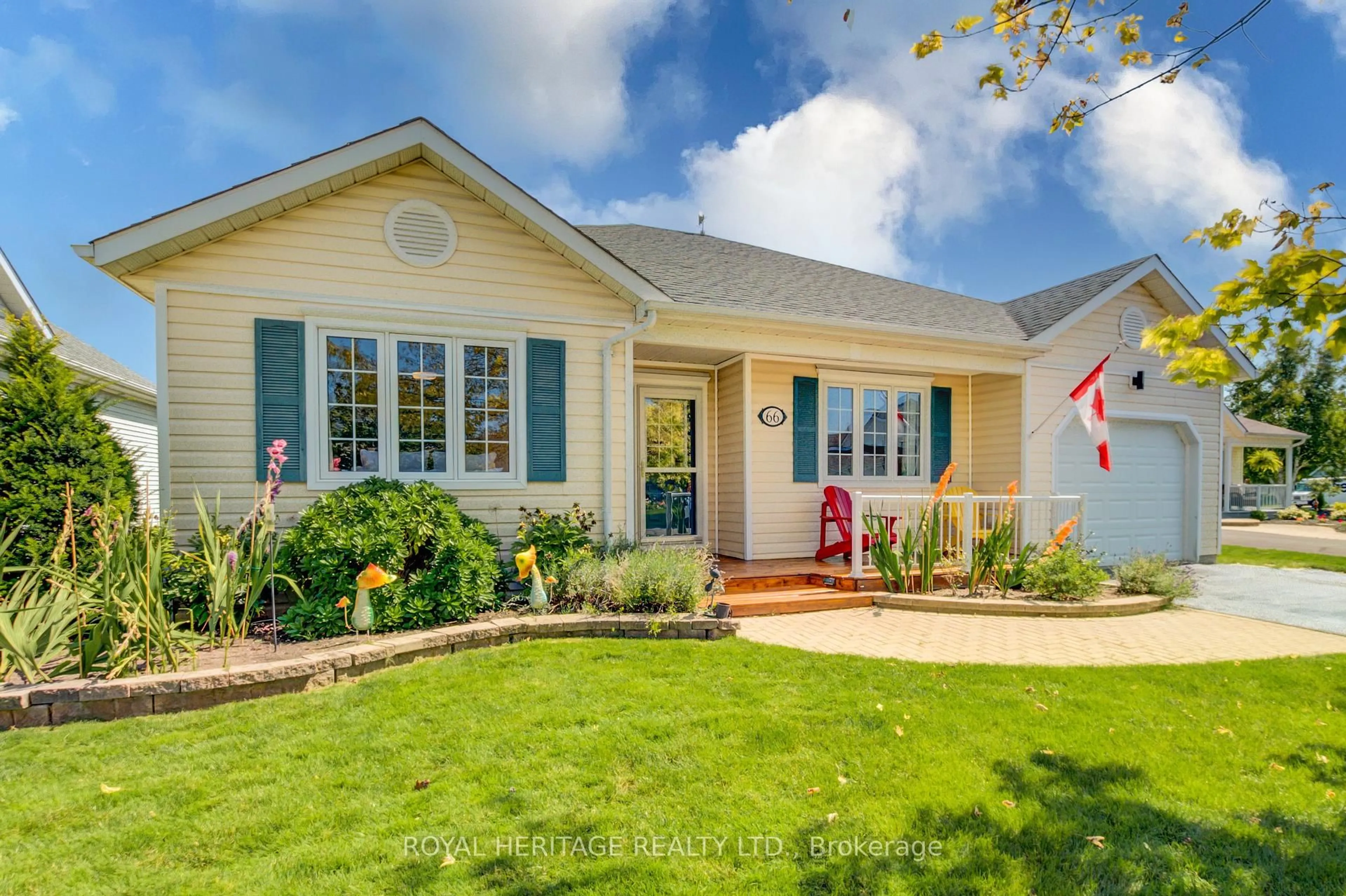 Home with vinyl exterior material, street for 66 Mills Rd, Brighton Ontario K0K 1H0