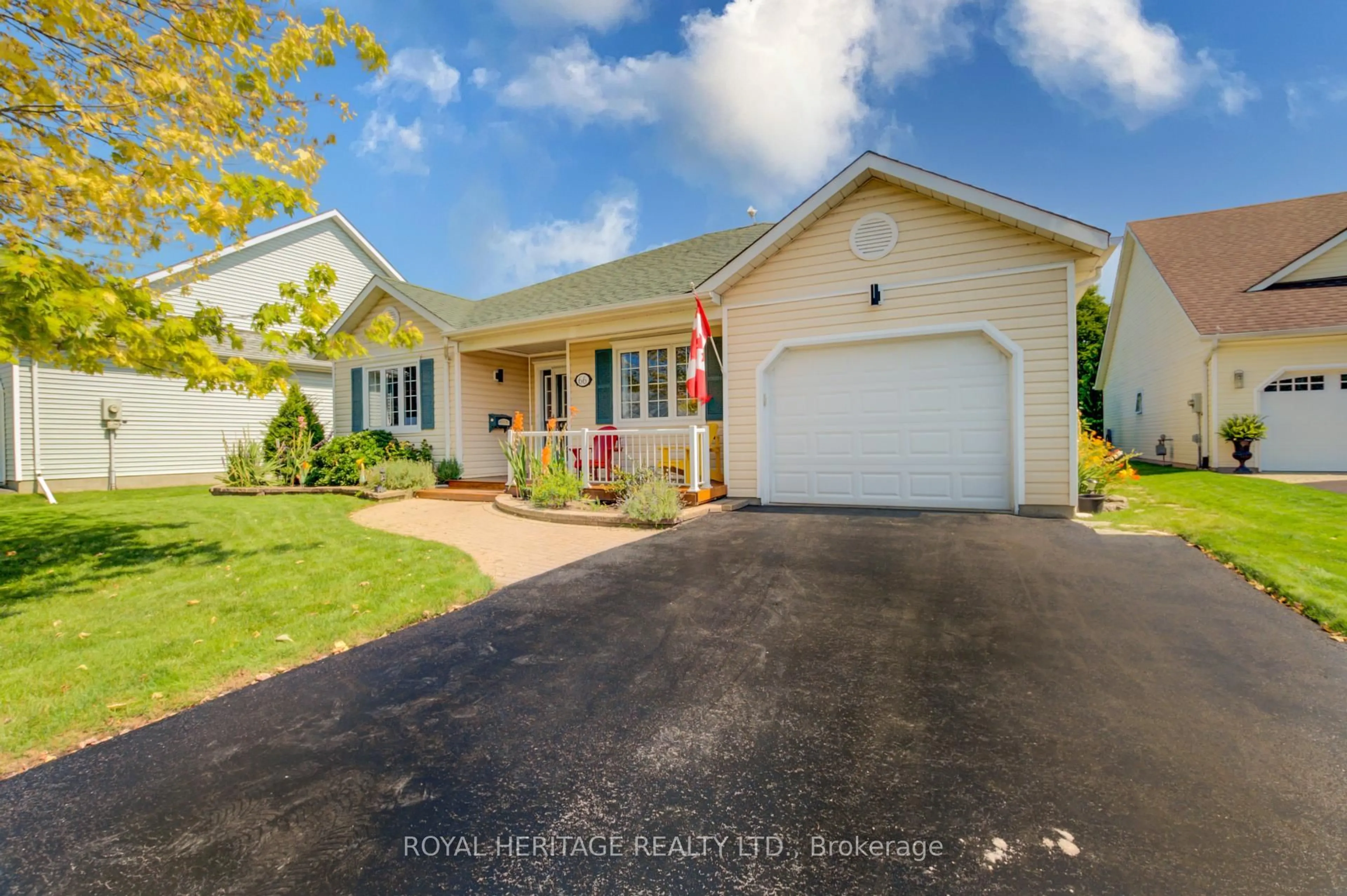 Home with vinyl exterior material, street for 66 Mills Rd, Brighton Ontario K0K 1H0