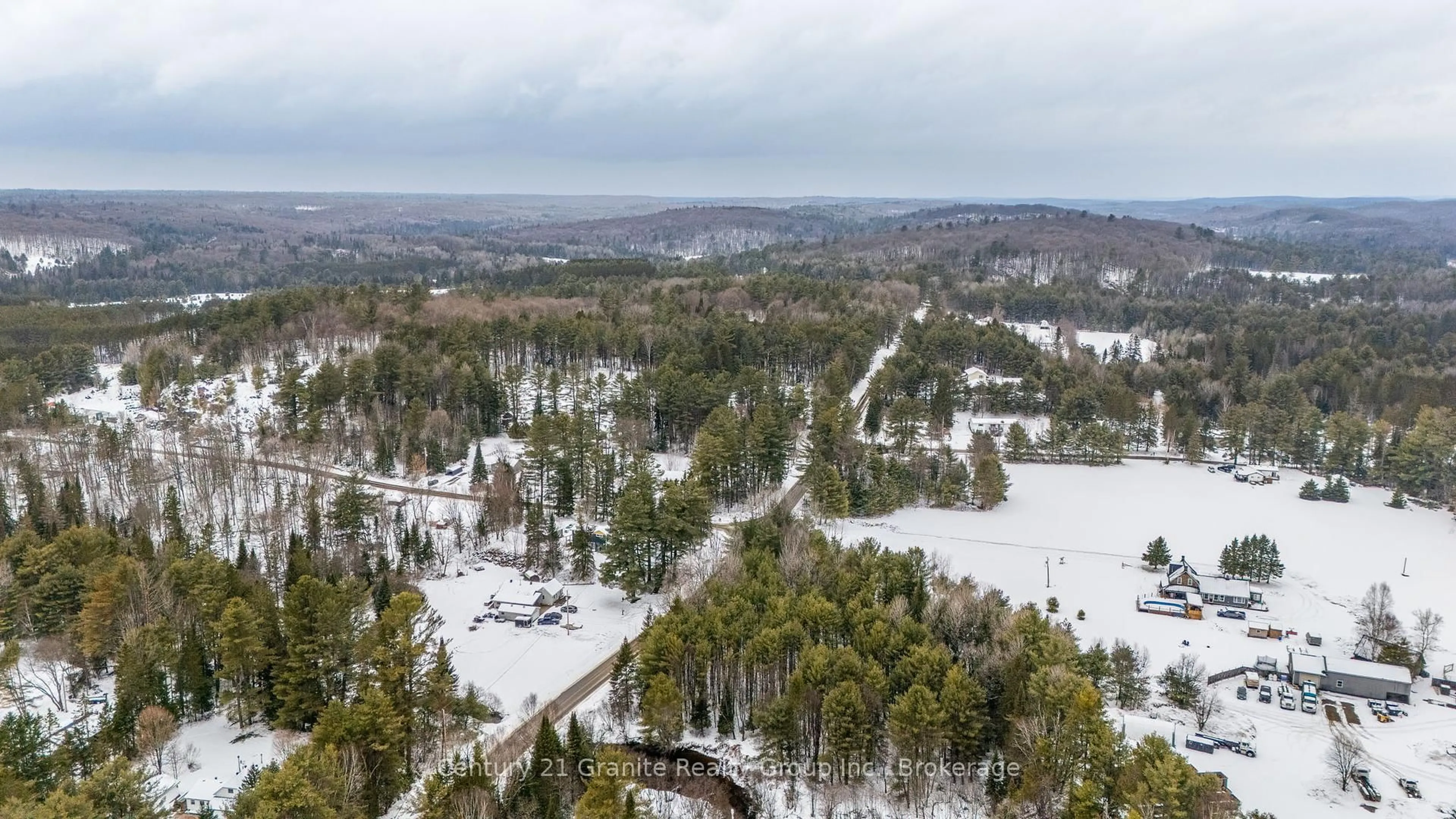 A pic from outside/outdoor area/front of a property/back of a property/a pic from drone, forest/trees view for 460 Bobcaygeon Rd, Minden Hills Ontario K0M 2K0