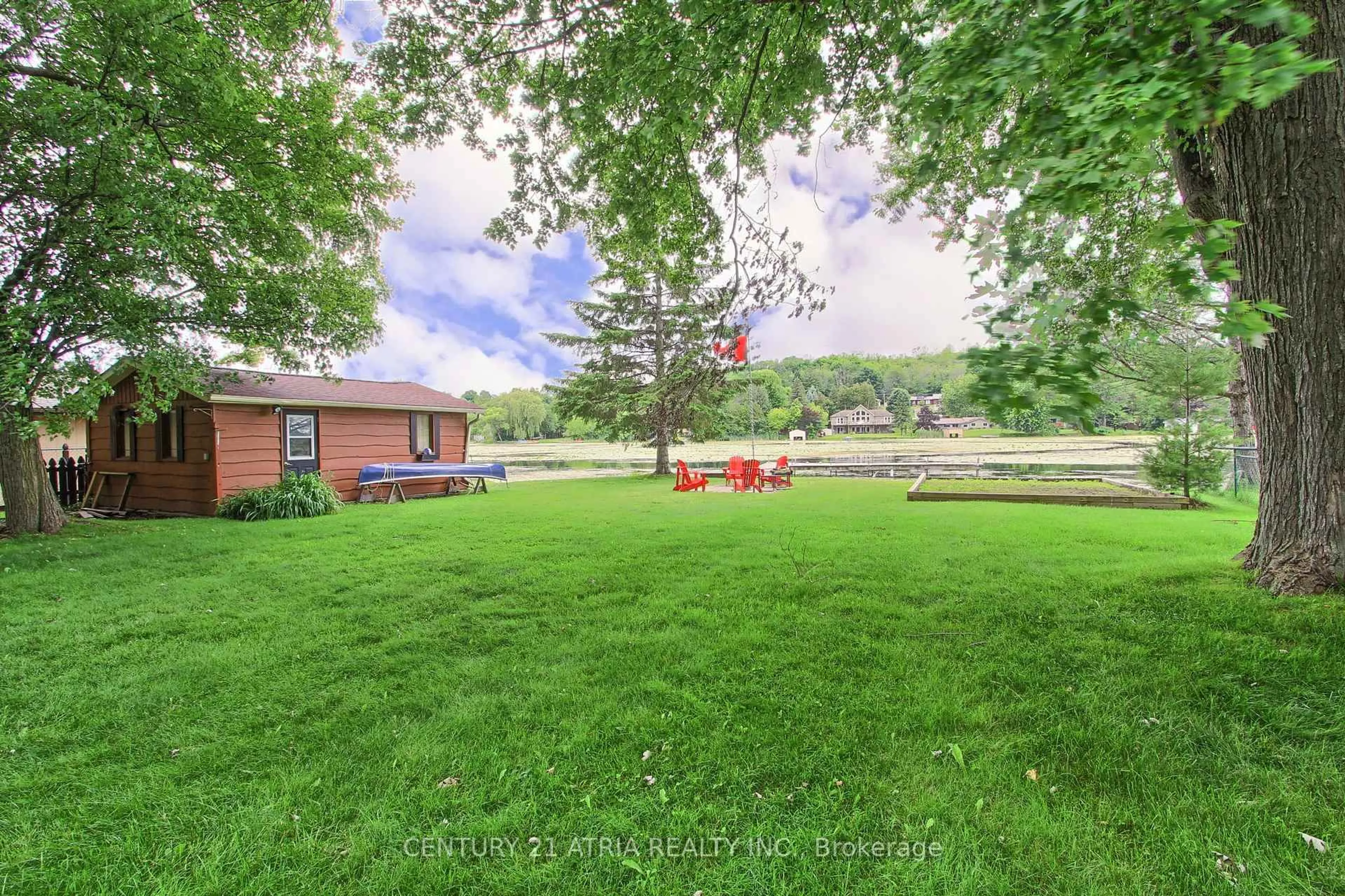 A pic from outside/outdoor area/front of a property/back of a property/a pic from drone, water/lake/river/ocean view for 54 Cadillac Blvd, Kawartha Lakes Ontario K0L 2W0