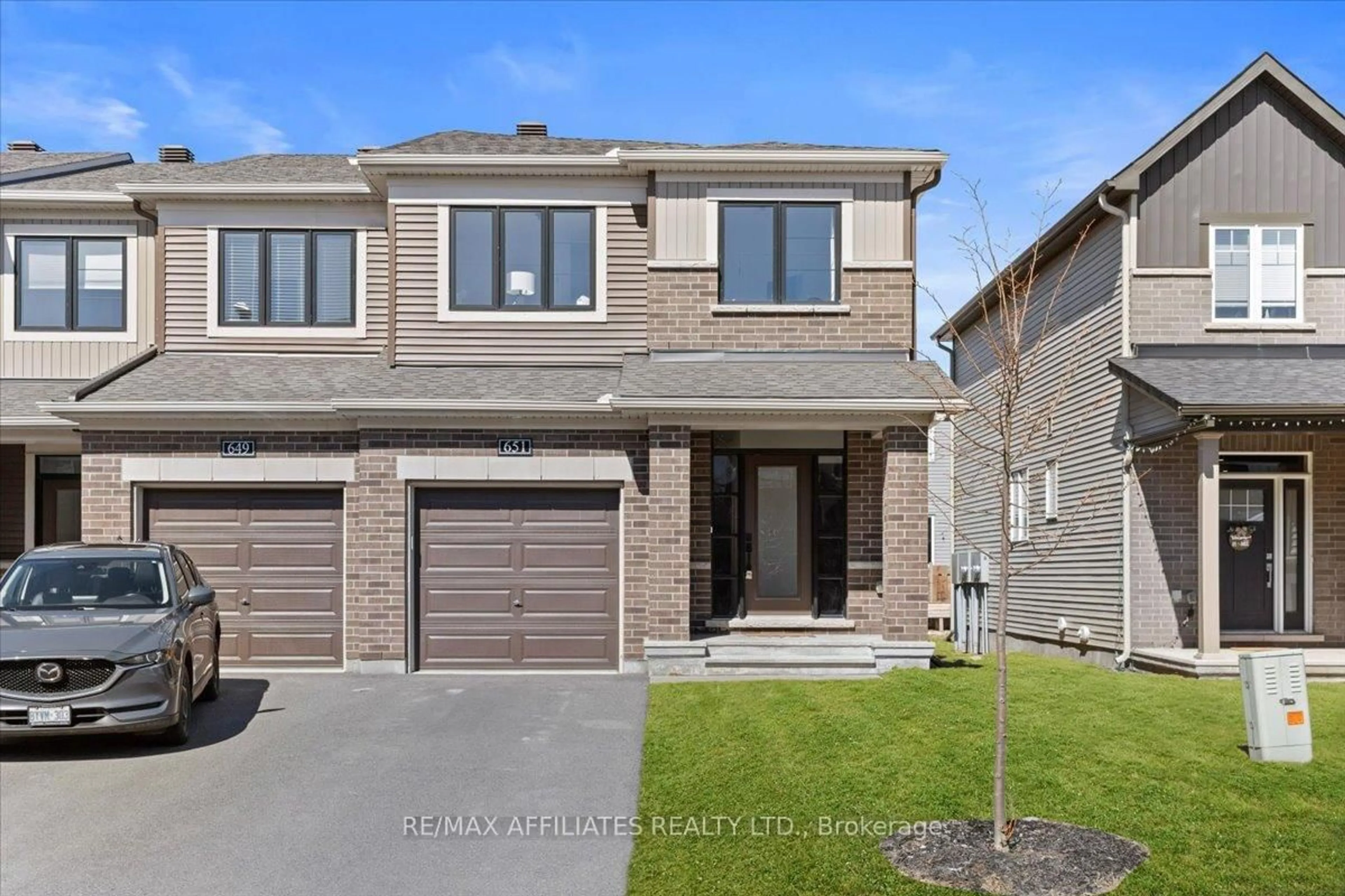 Home with brick exterior material, street for 651 Prominence Way, Orleans Ontario K4A 5K6