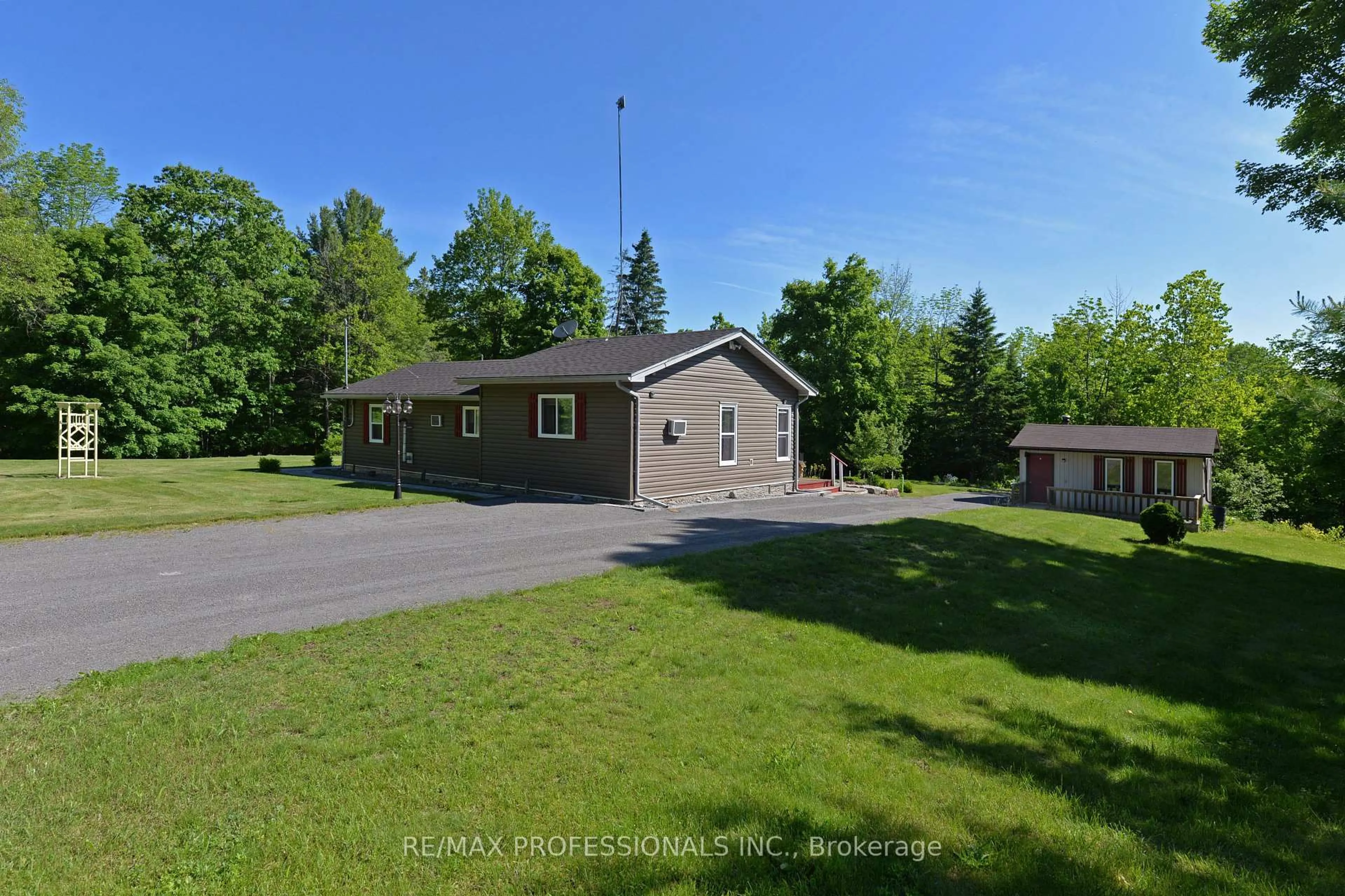 A pic from outside/outdoor area/front of a property/back of a property/a pic from drone, street for 15 Cedar Hill Rd, Trent Hills Ontario K0K 2M0