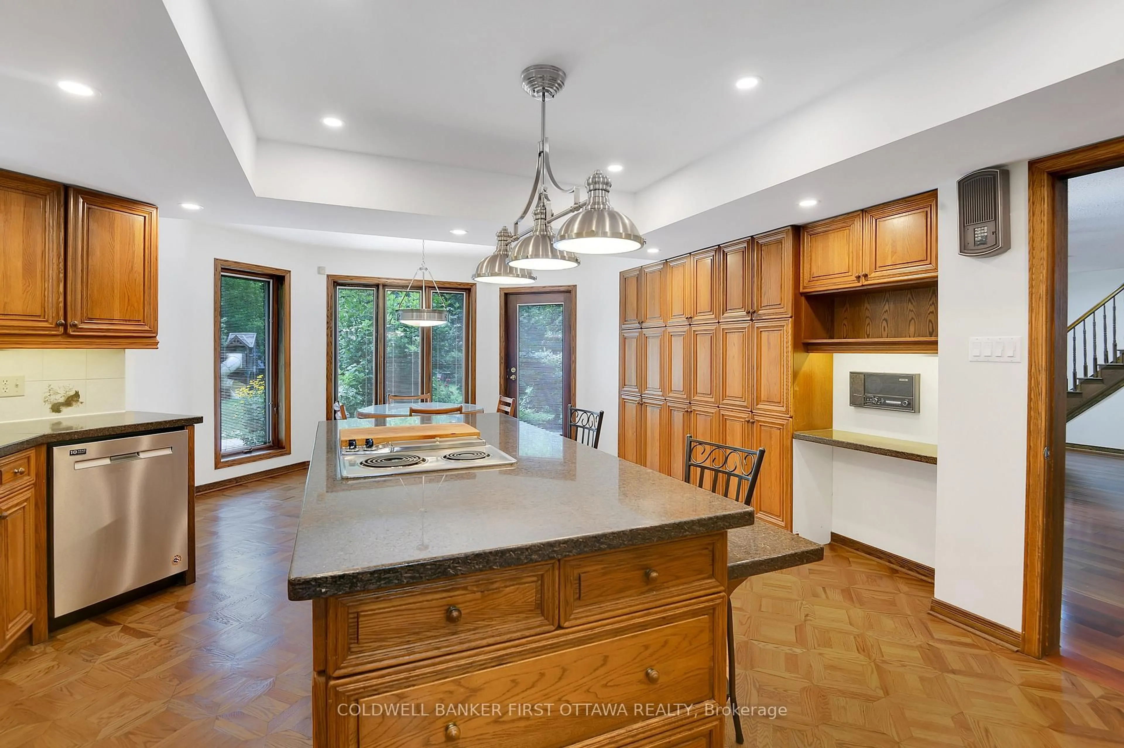 Open concept kitchen, ceramic/tile floor for 8 Woodsia Ave, Ottawa Ontario K2R 1A9