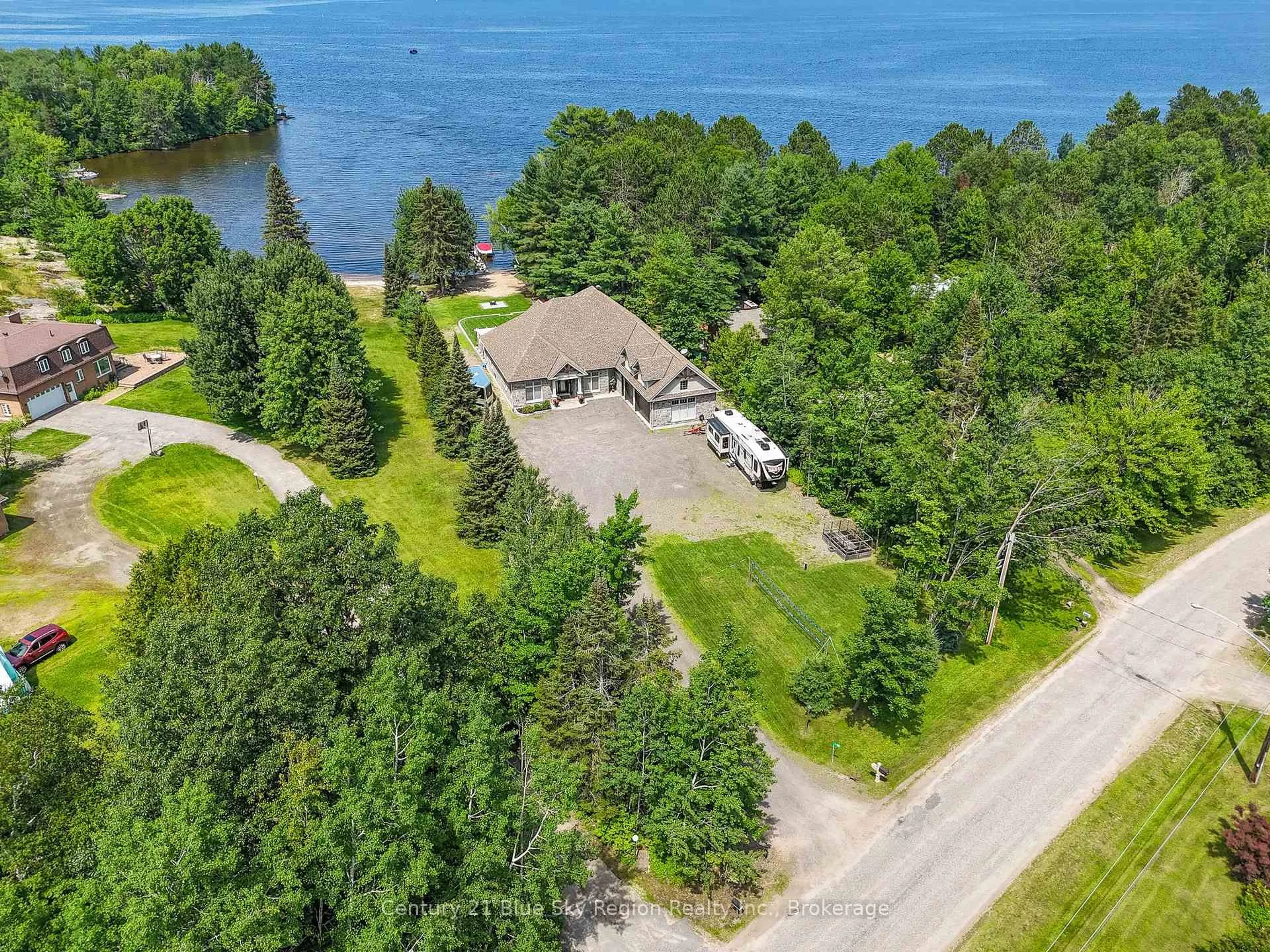 A pic from outside/outdoor area/front of a property/back of a property/a pic from drone, water/lake/river/ocean view for 34 Sunrise Bay Dr, Callander Ontario P0H 1H0