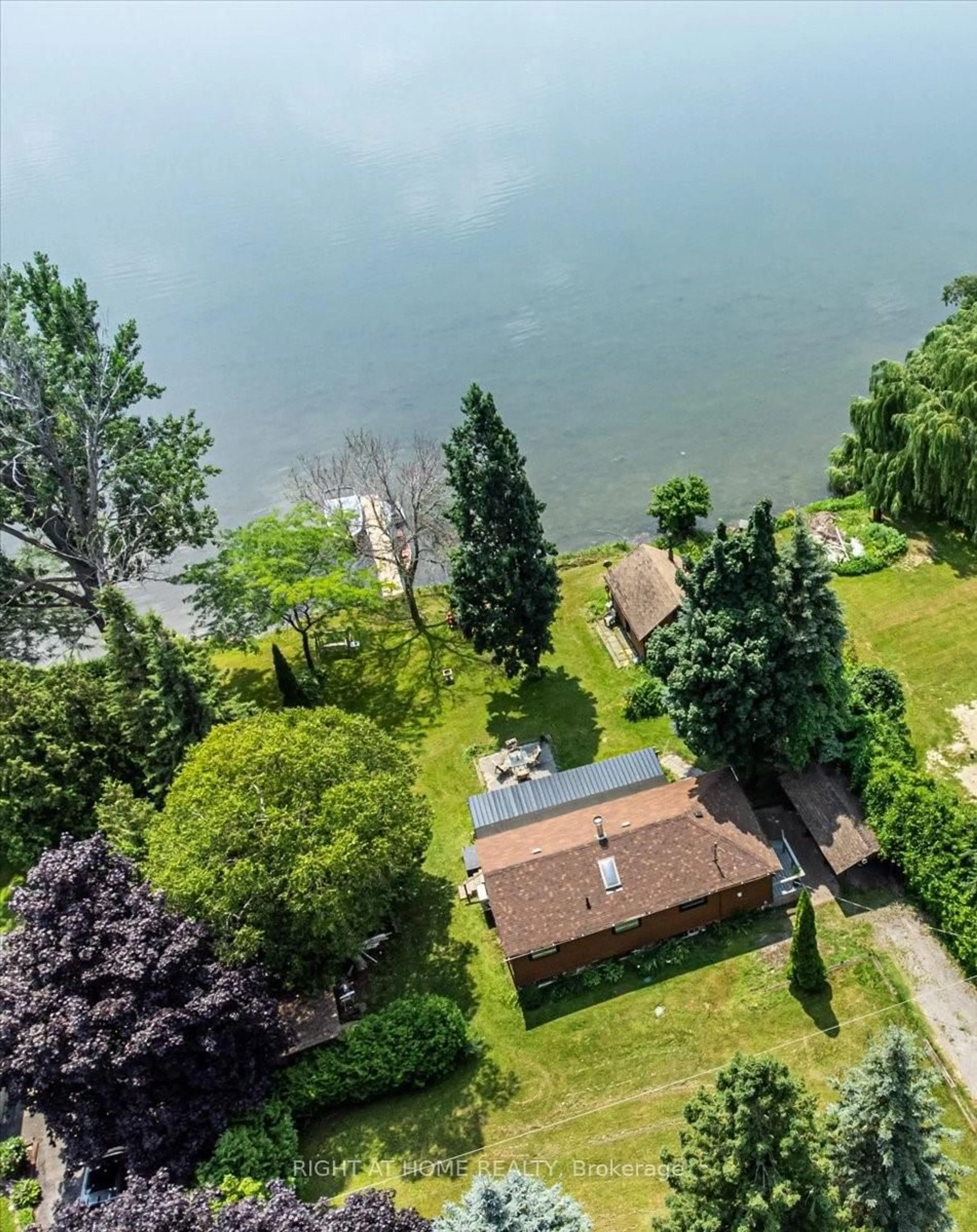 A pic from outside/outdoor area/front of a property/back of a property/a pic from drone, water/lake/river/ocean view for 93 Oakdene Cres, Kawartha Lakes Ontario K0M 2C0