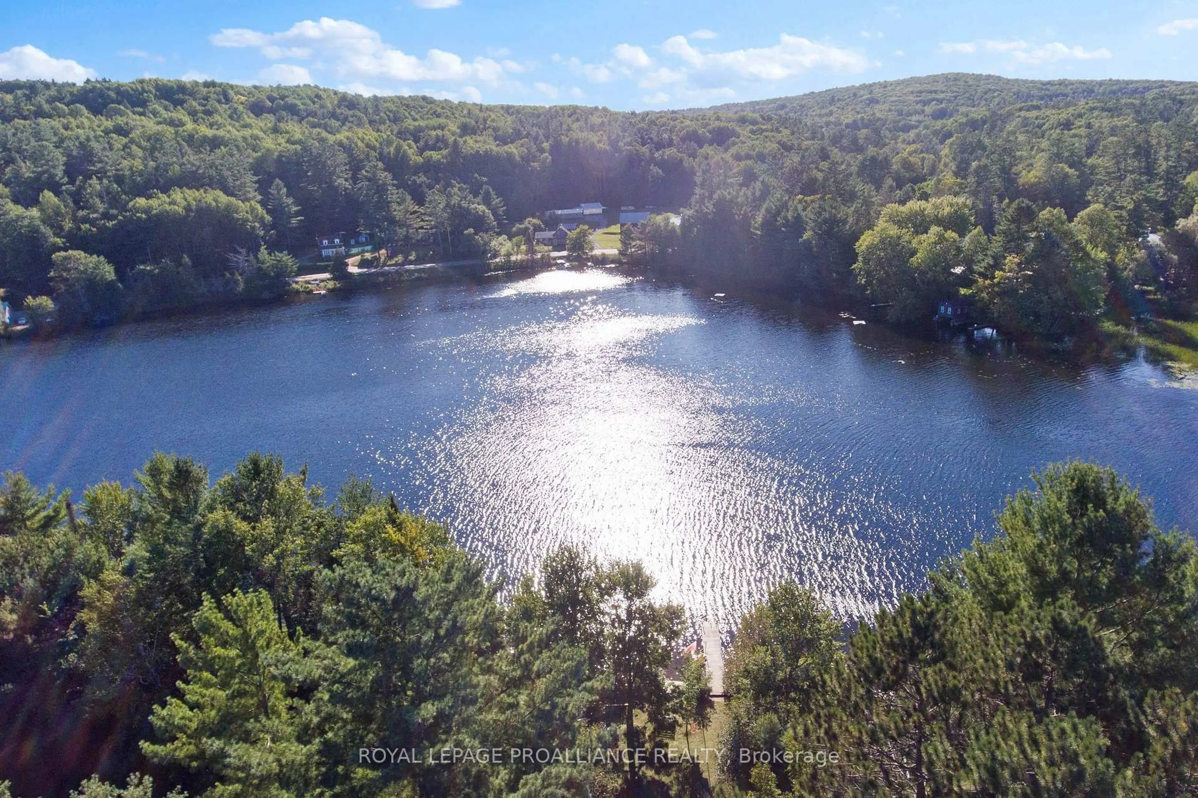 A pic from outside/outdoor area/front of a property/back of a property/a pic from drone, water/lake/river/ocean view for 25B Cormorant Lane, Combermere Ontario K0J 1L0