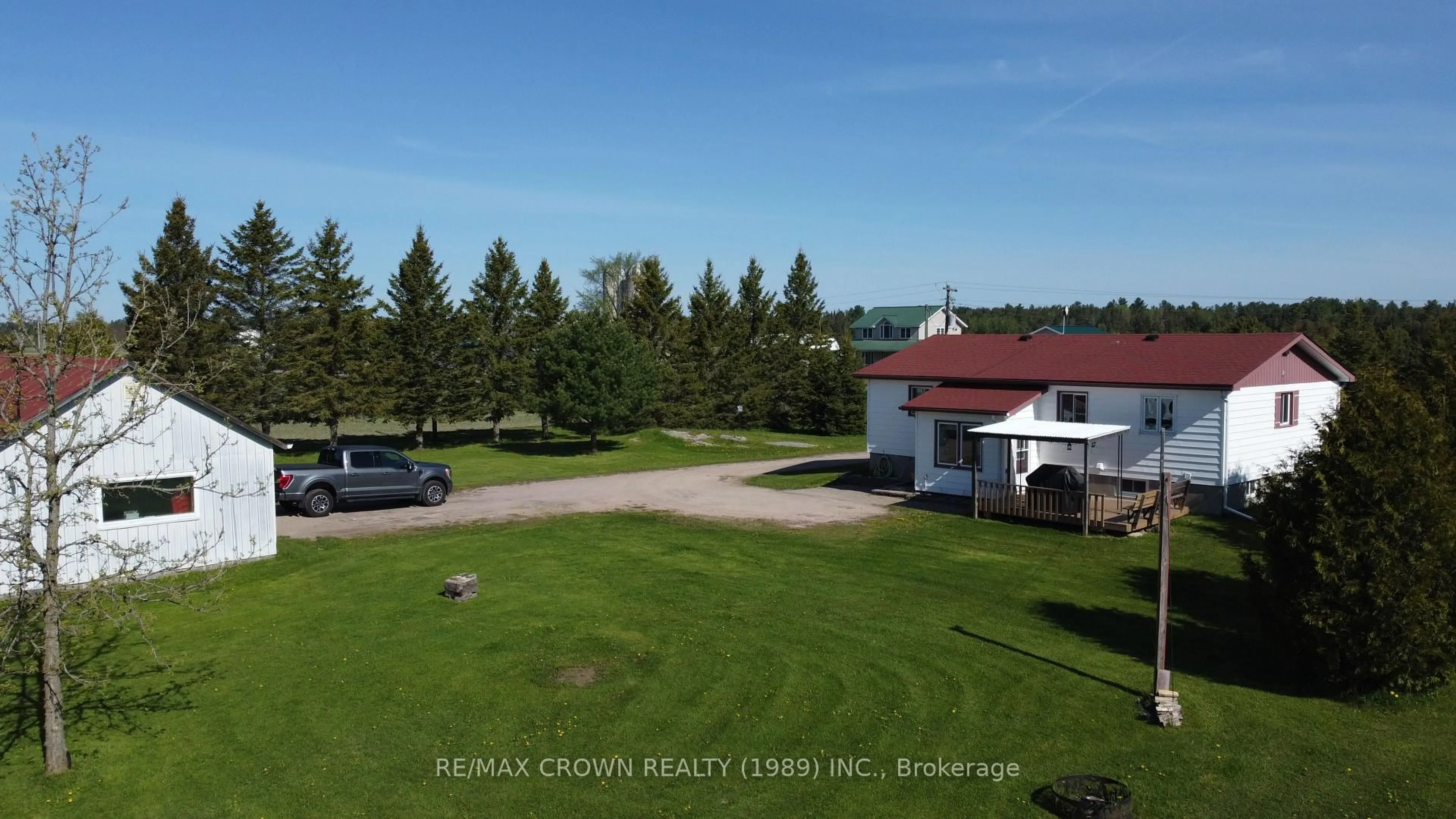 A pic from outside/outdoor area/front of a property/back of a property/a pic from drone, unknown for 492 Leclair Rd, West Nipissing Ontario P0H 2M0