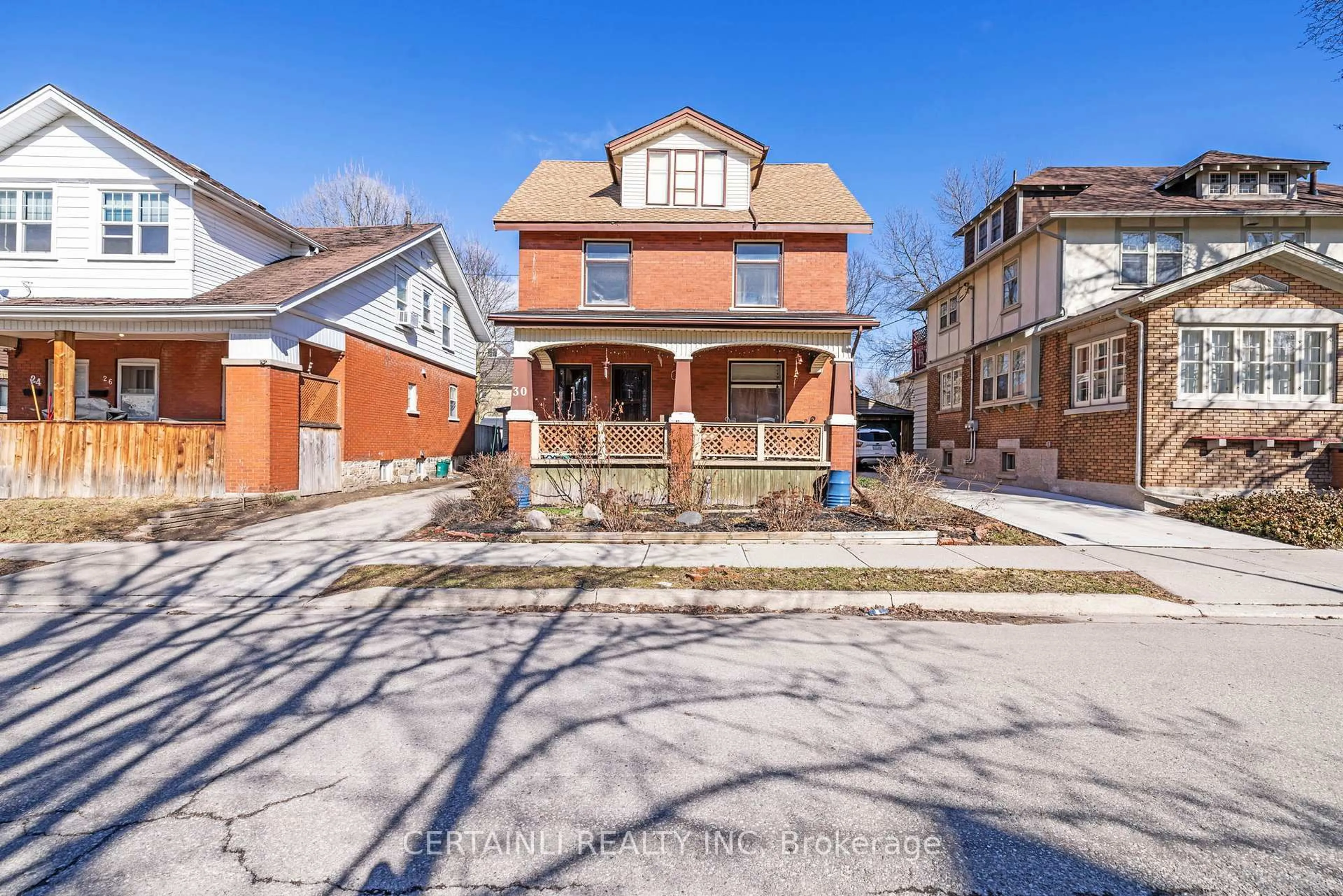 Home with brick exterior material, street for 30 Hohner Ave, Kitchener Ontario N2H 2V4