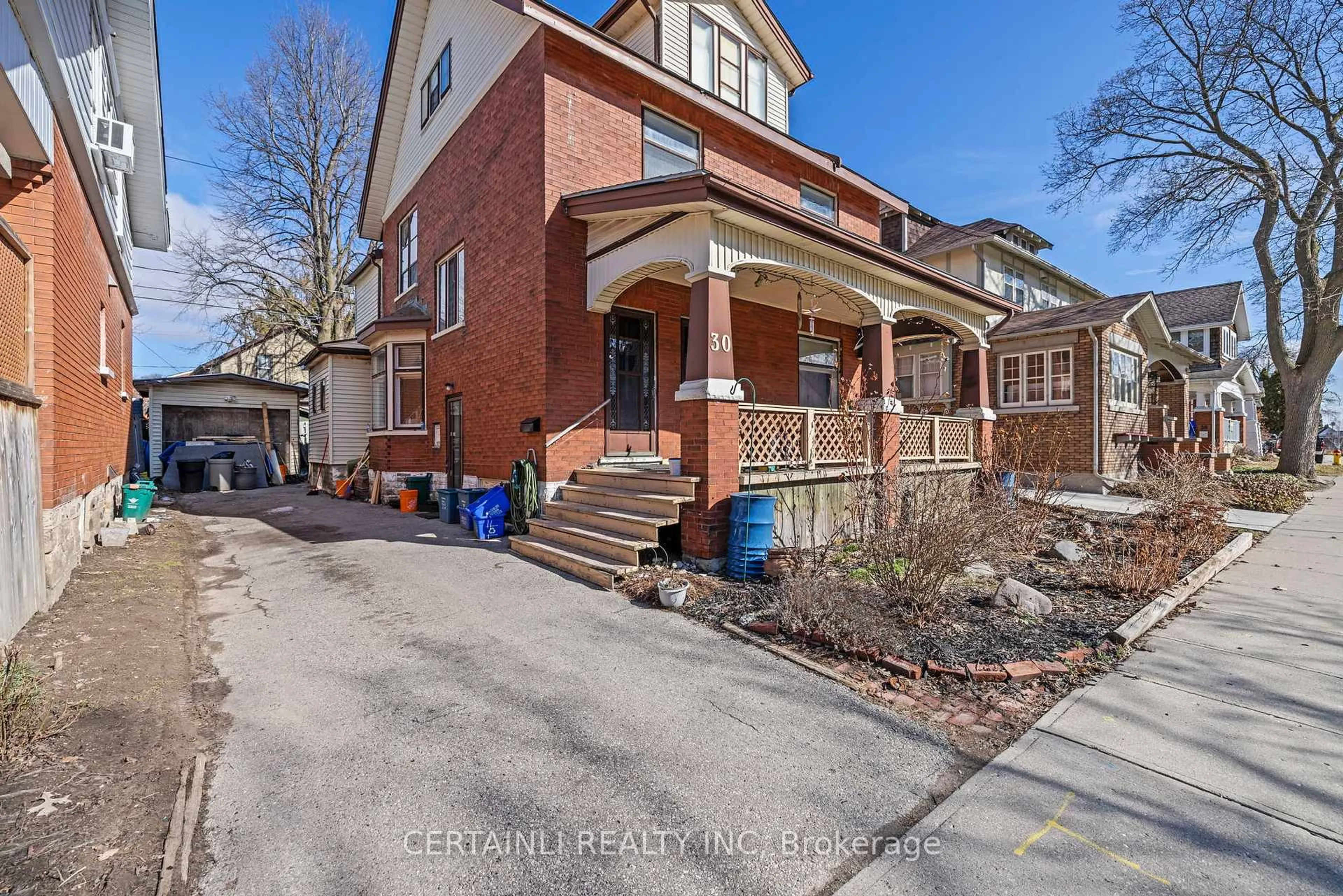 Home with brick exterior material, street for 30 Hohner Ave, Kitchener Ontario N2H 2V4