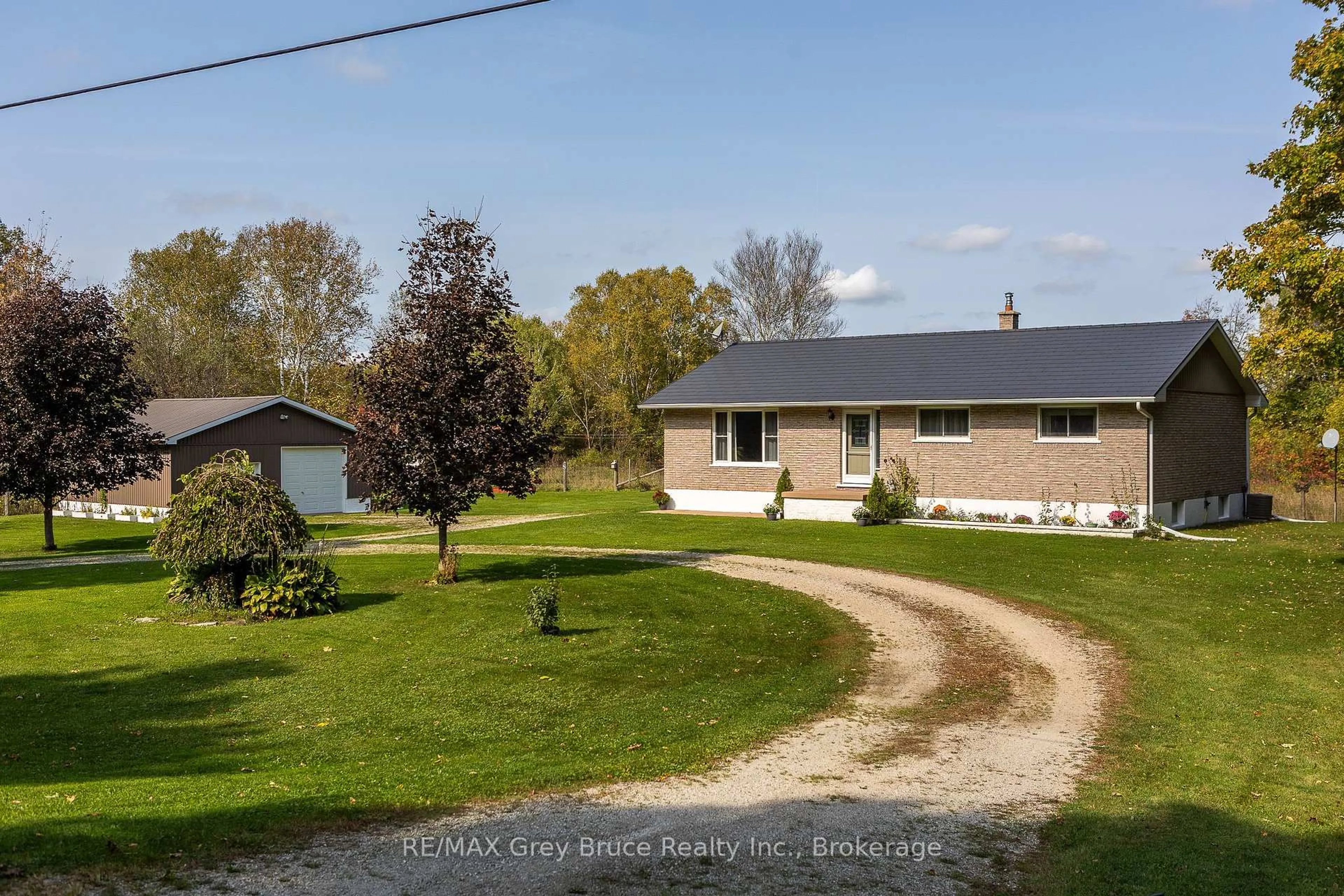 A pic from outside/outdoor area/front of a property/back of a property/a pic from drone, street for 362511 Lindenwood Rd, Georgian Bluffs Ontario N0H 2T0