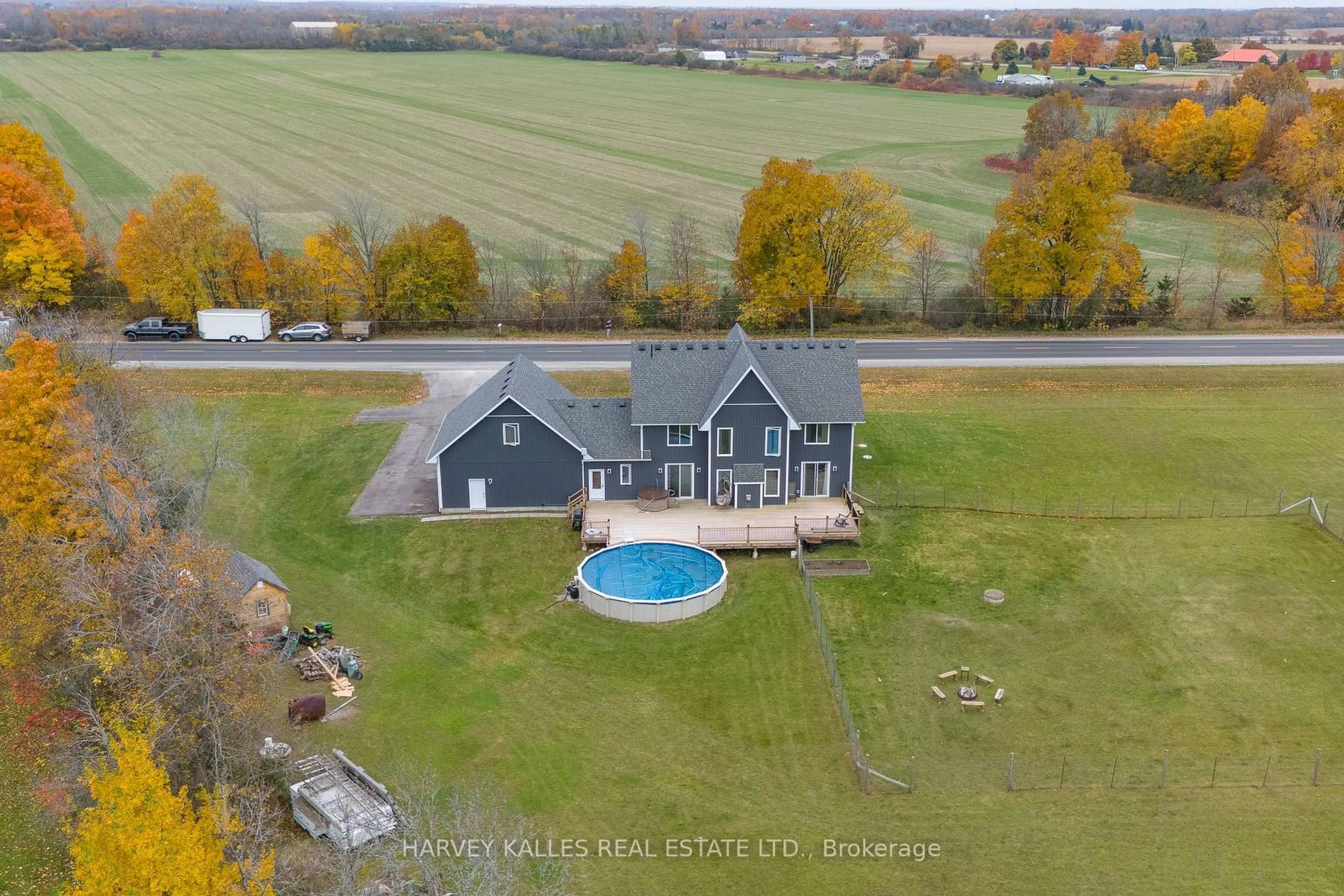 A pic from outside/outdoor area/front of a property/back of a property/a pic from drone, water/lake/river/ocean view for 2100 County Rd 1 Rd, Prince Edward County Ontario K0K 1G0