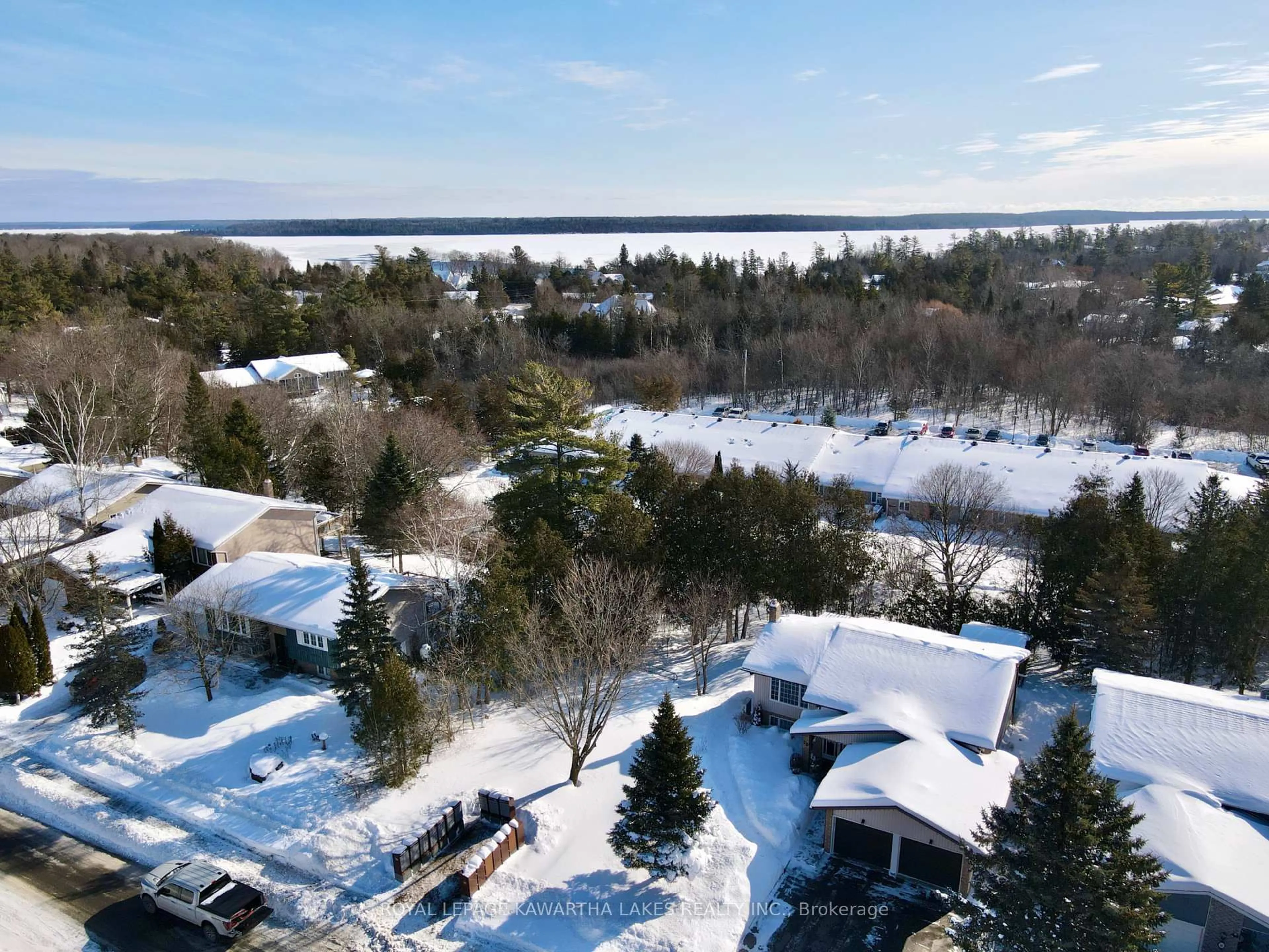 A pic from outside/outdoor area/front of a property/back of a property/a pic from drone, water/lake/river/ocean view for 20 Cedartree Lane, Kawartha Lakes Ontario K0M 1A0