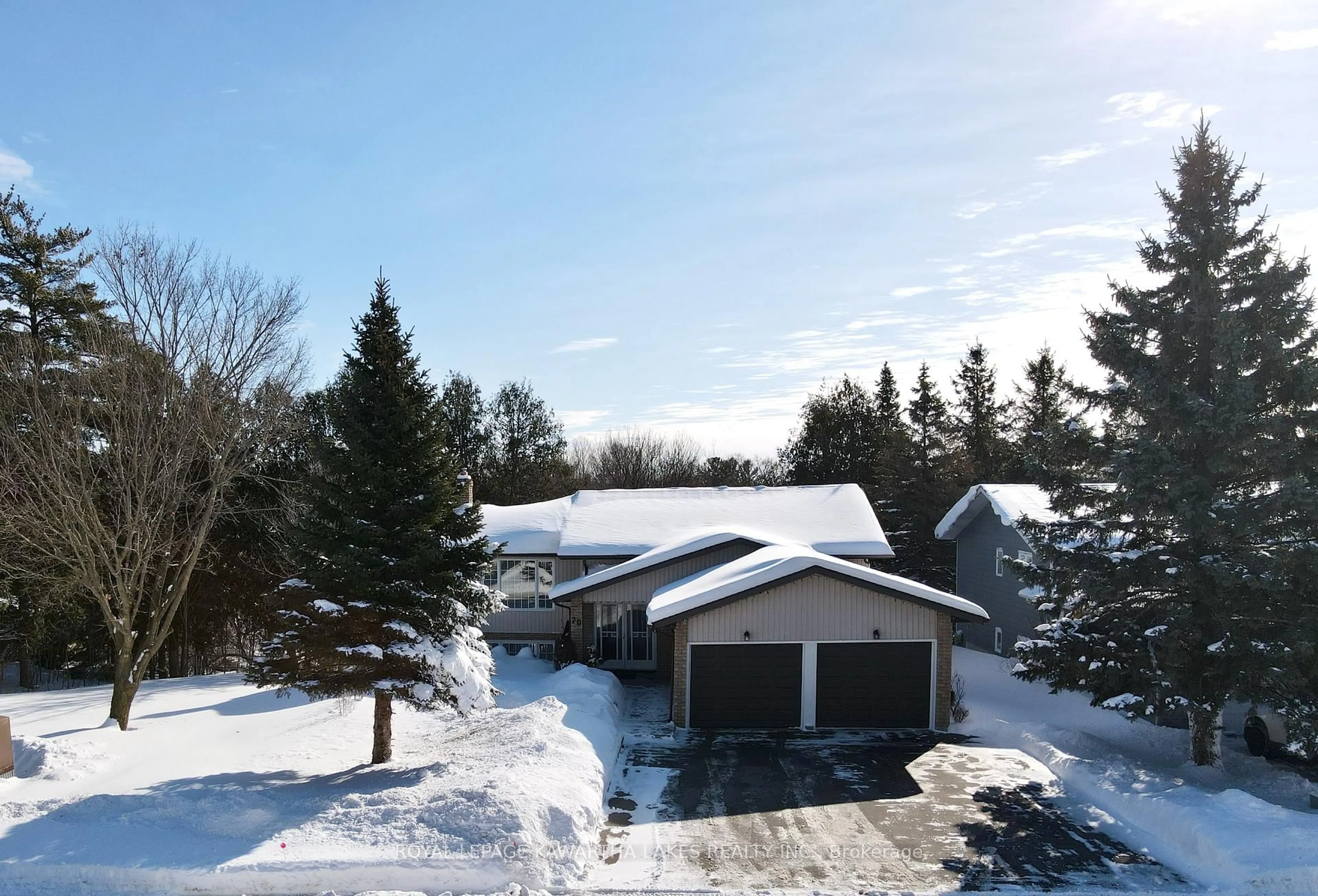 A pic from outside/outdoor area/front of a property/back of a property/a pic from drone, street for 20 Cedartree Lane, Kawartha Lakes Ontario K0M 1A0