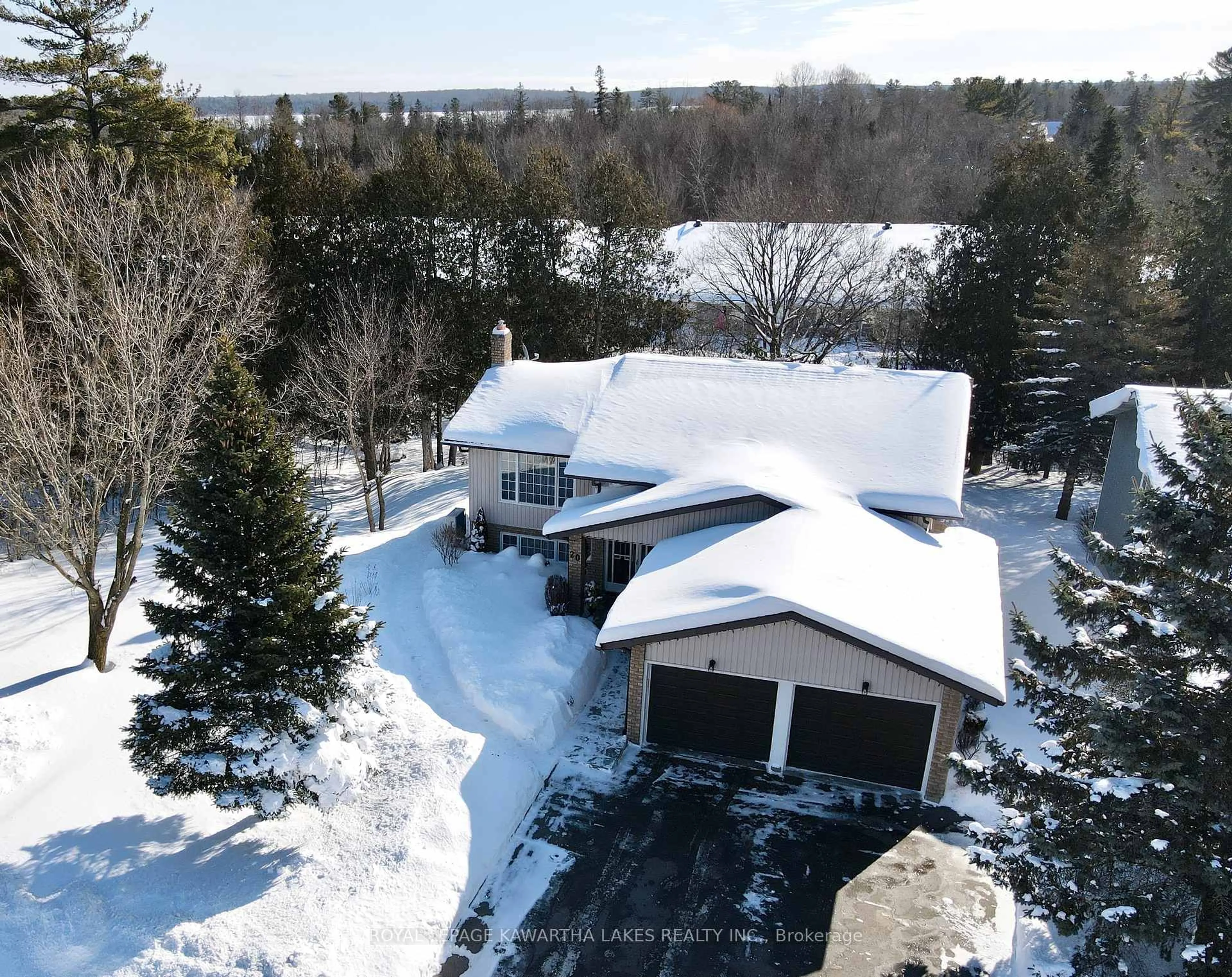 A pic from outside/outdoor area/front of a property/back of a property/a pic from drone, unknown for 20 Cedartree Lane, Kawartha Lakes Ontario K0M 1A0