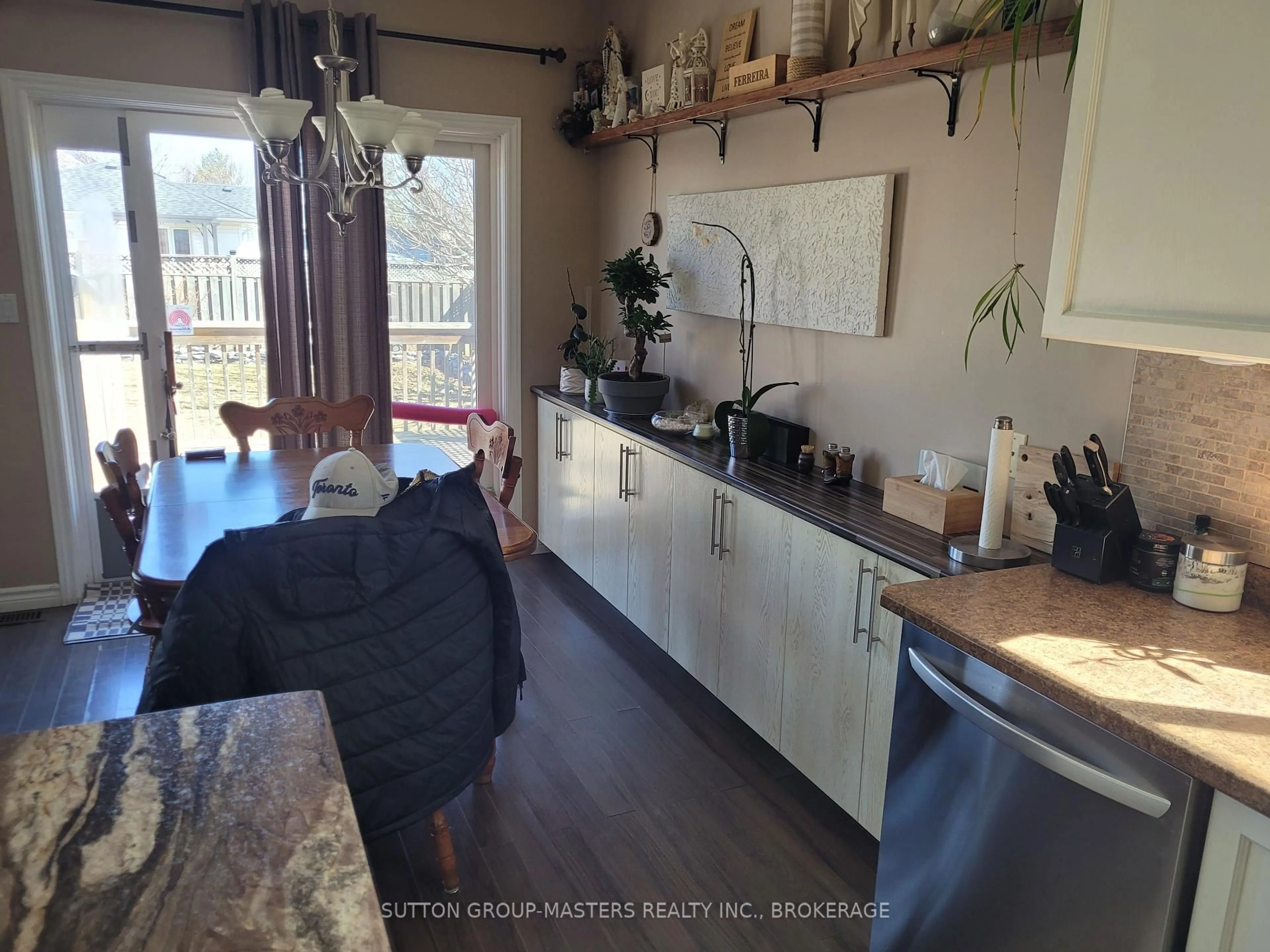 Open concept kitchen, wood/laminate floor for 129 Macdougall Dr, Loyalist Ontario K7N 0A2