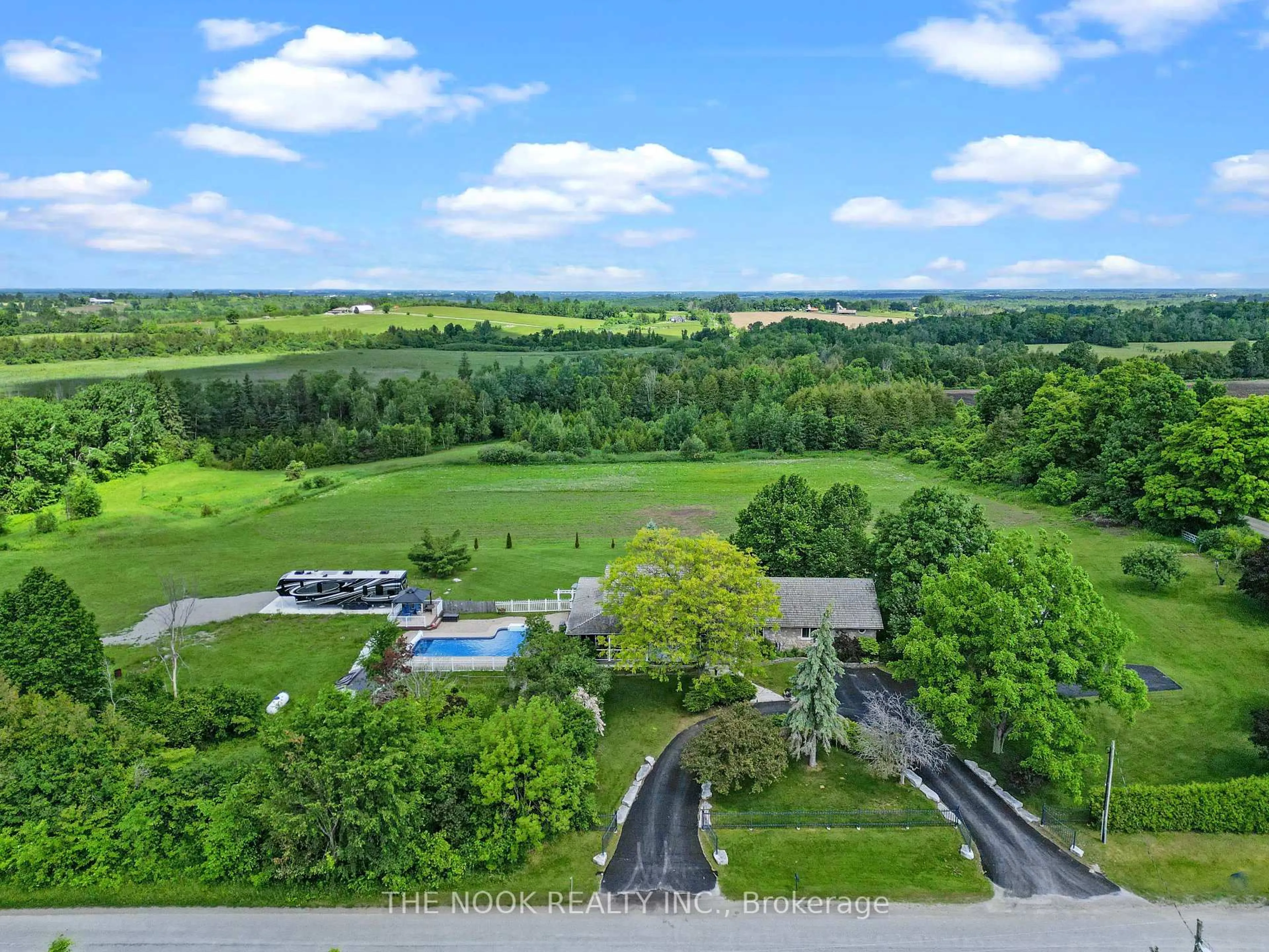 A pic from outside/outdoor area/front of a property/back of a property/a pic from drone, water/lake/river/ocean view for 593 Pigeon Creek Rd, Kawartha Lakes Ontario L0B 1K0