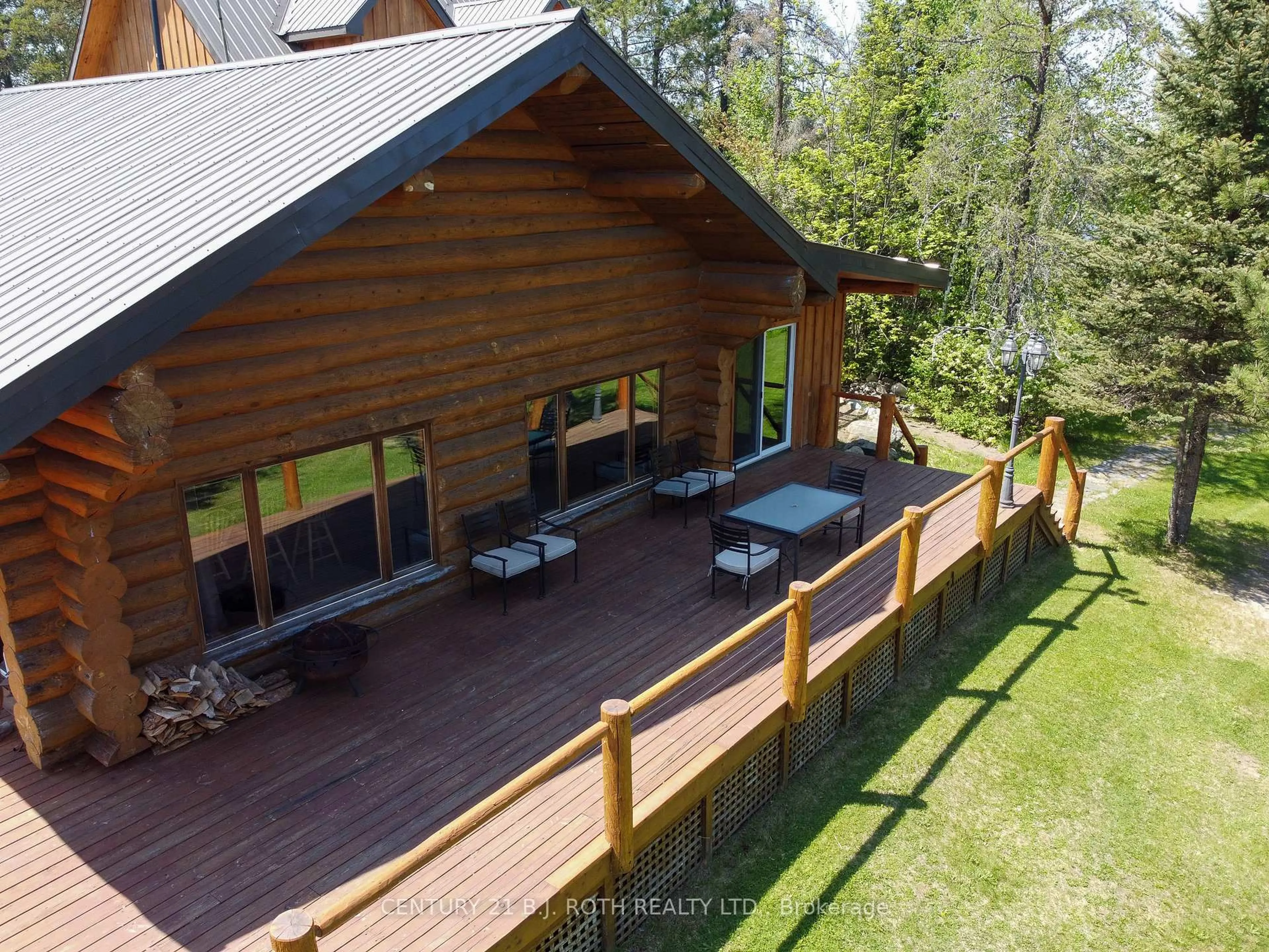 A pic from outside/outdoor area/front of a property/back of a property/a pic from drone, mountain view for 59 White Bear Crt, Temagami Ontario P0H 2H0