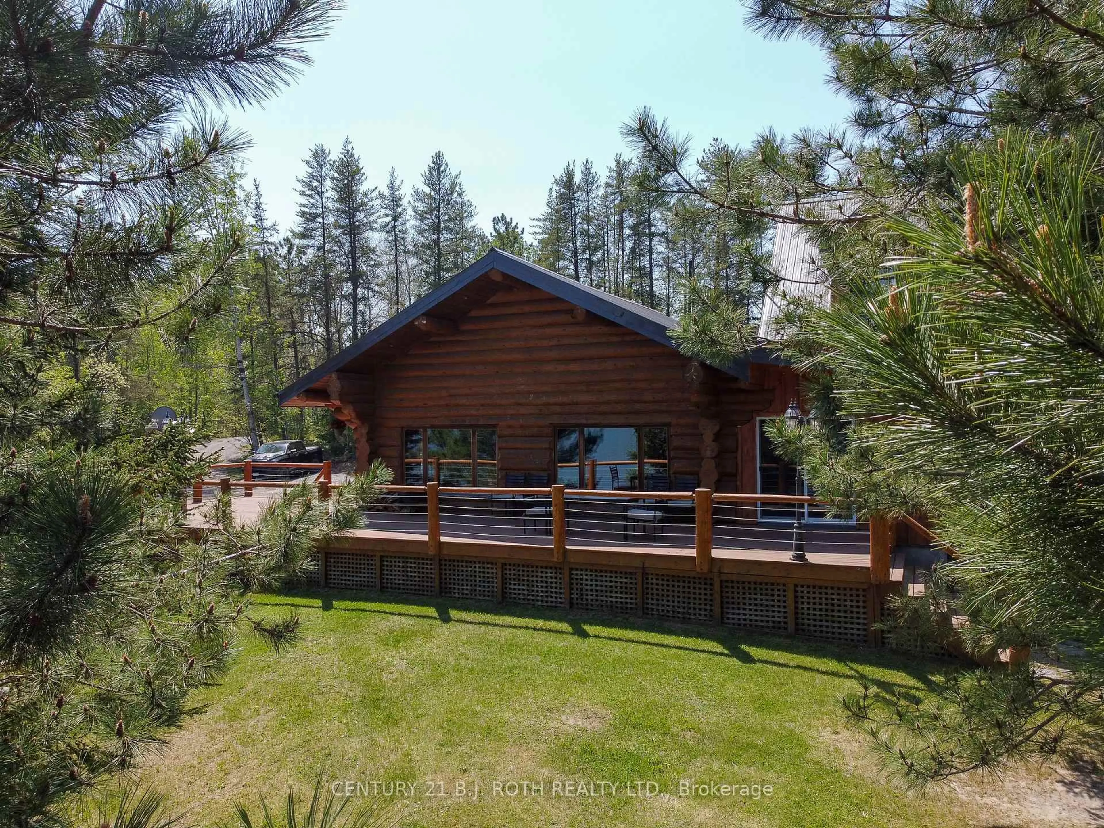 A pic from outside/outdoor area/front of a property/back of a property/a pic from drone, forest/trees view for 59 White Bear Crt, Temagami Ontario P0H 2H0