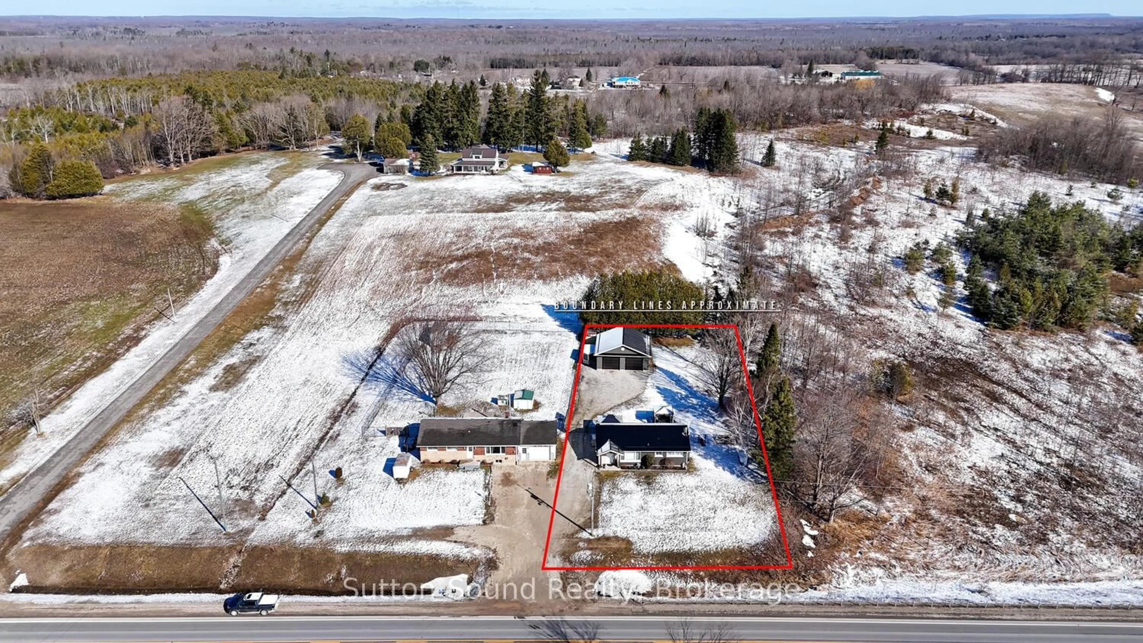 A pic from outside/outdoor area/front of a property/back of a property/a pic from drone, building for 202093 21 Highway, Georgian Bluffs Ontario N4K 5N7