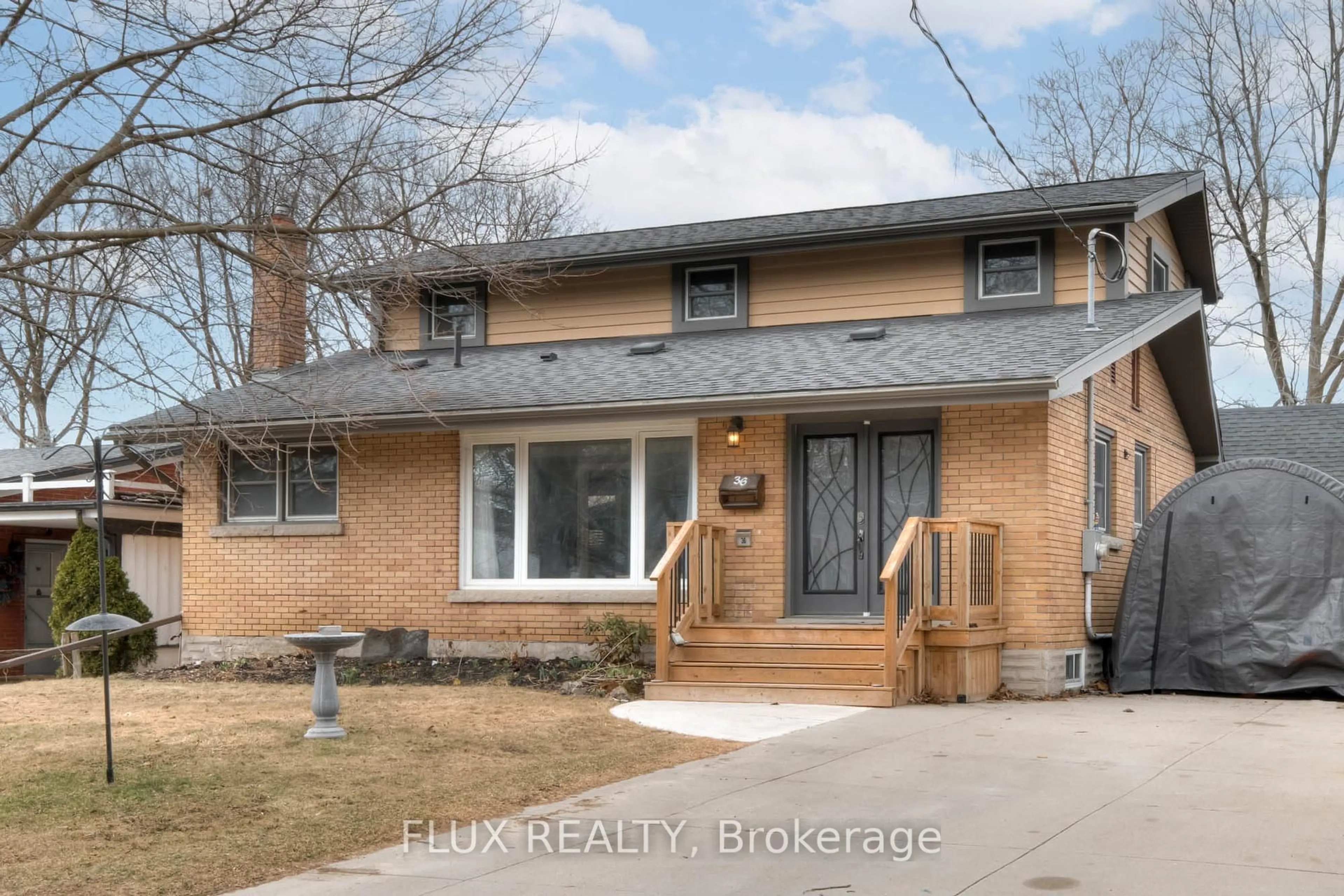 Home with brick exterior material, street for 36 Perkell Pl, Kitchener Ontario N2B 1J4