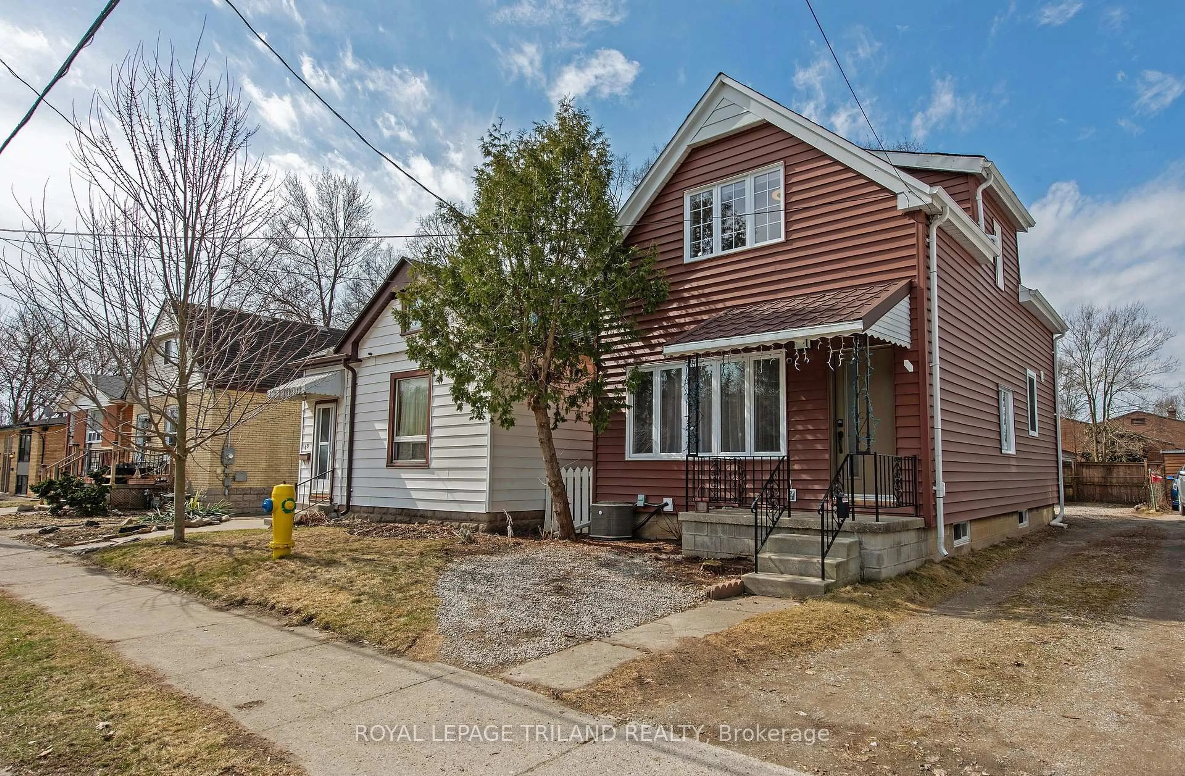 Home with brick exterior material, street for 71 Dillabough St, London Ontario N5Z 2B9