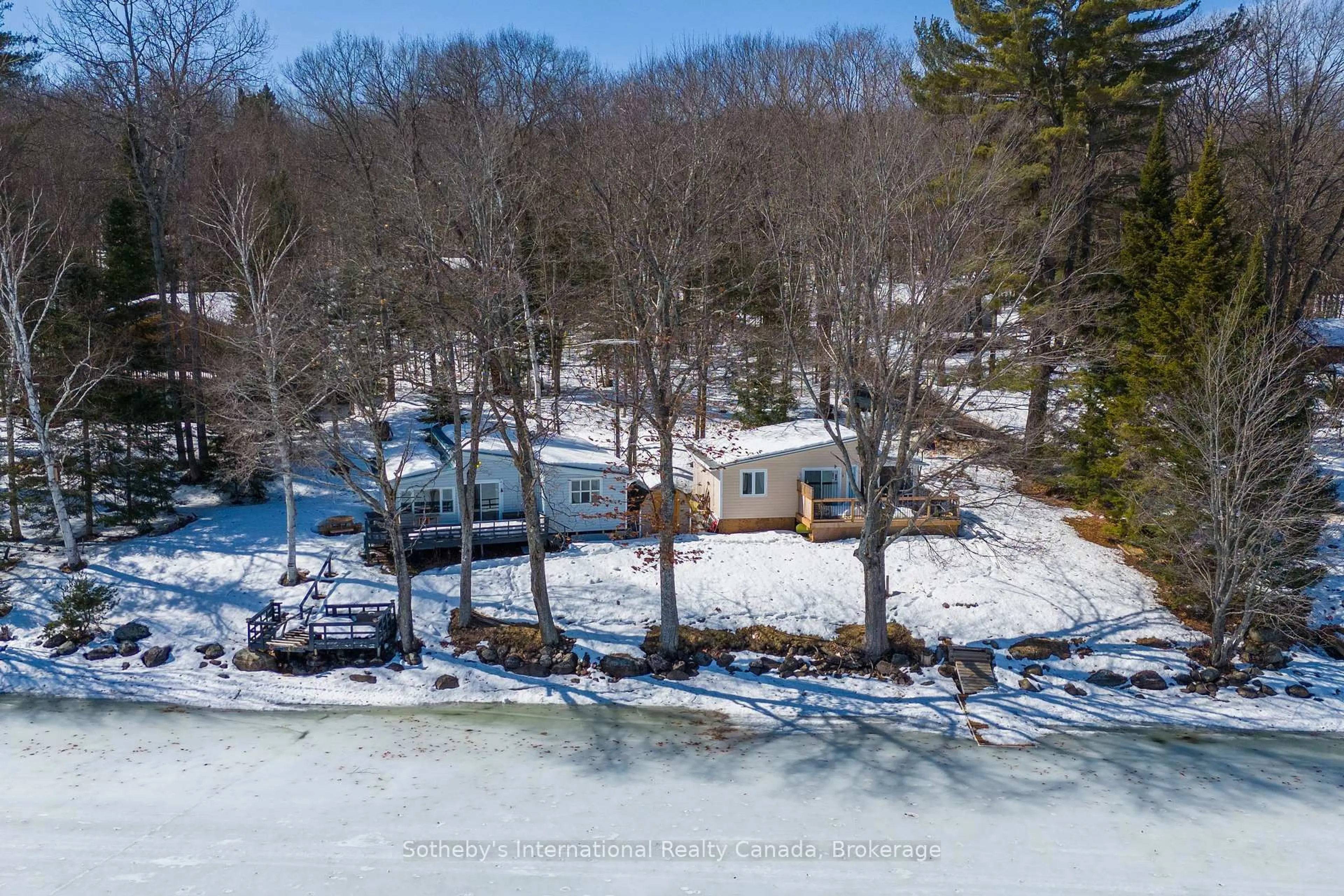 A pic from outside/outdoor area/front of a property/back of a property/a pic from drone, water/lake/river/ocean view for 1028 Hillcrest Lane, Algonquin Highlands Ontario K0M 1S0