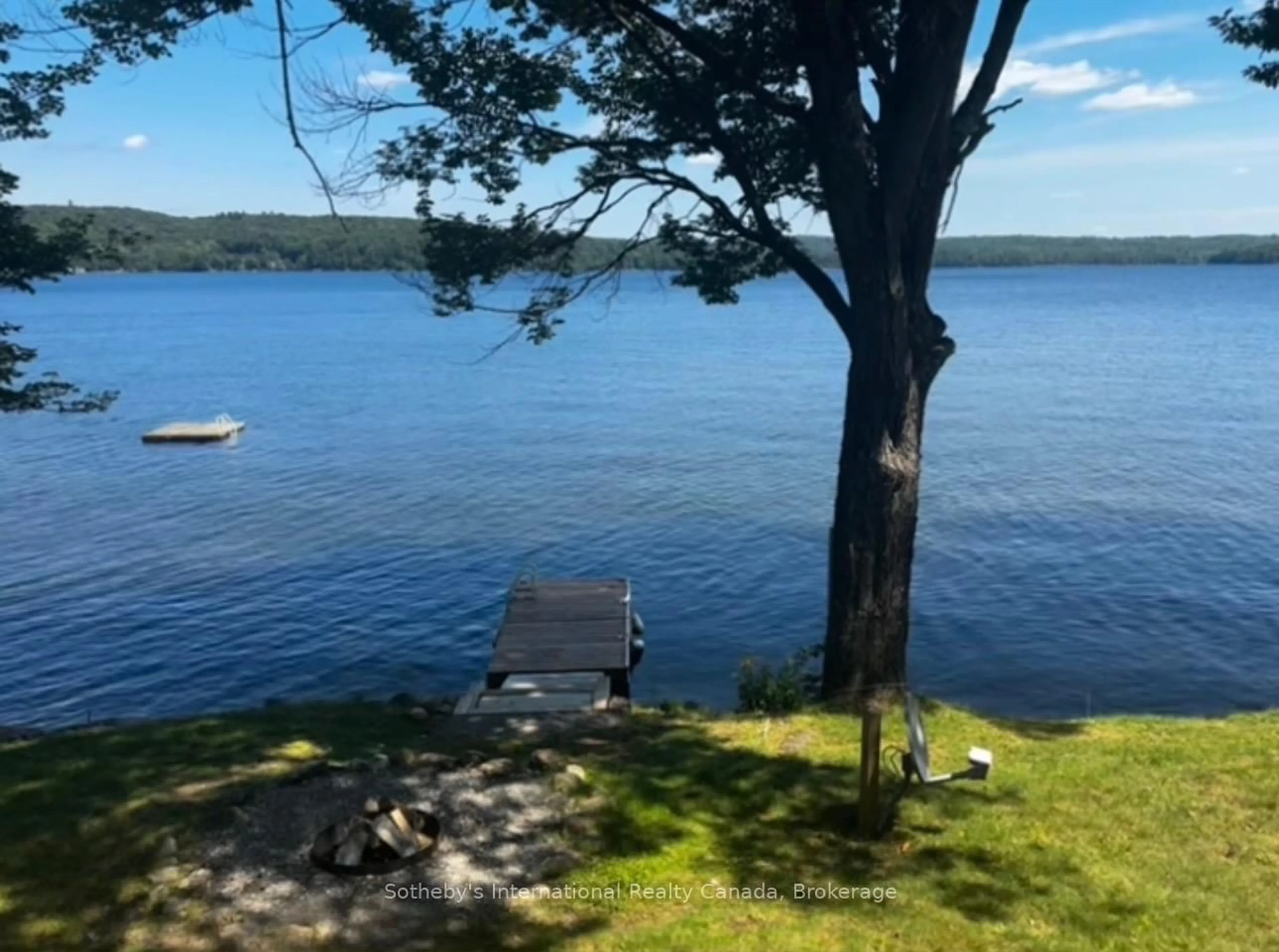 A pic from outside/outdoor area/front of a property/back of a property/a pic from drone, water/lake/river/ocean view for 1028 Hillcrest Lane, Algonquin Highlands Ontario K0M 1S0