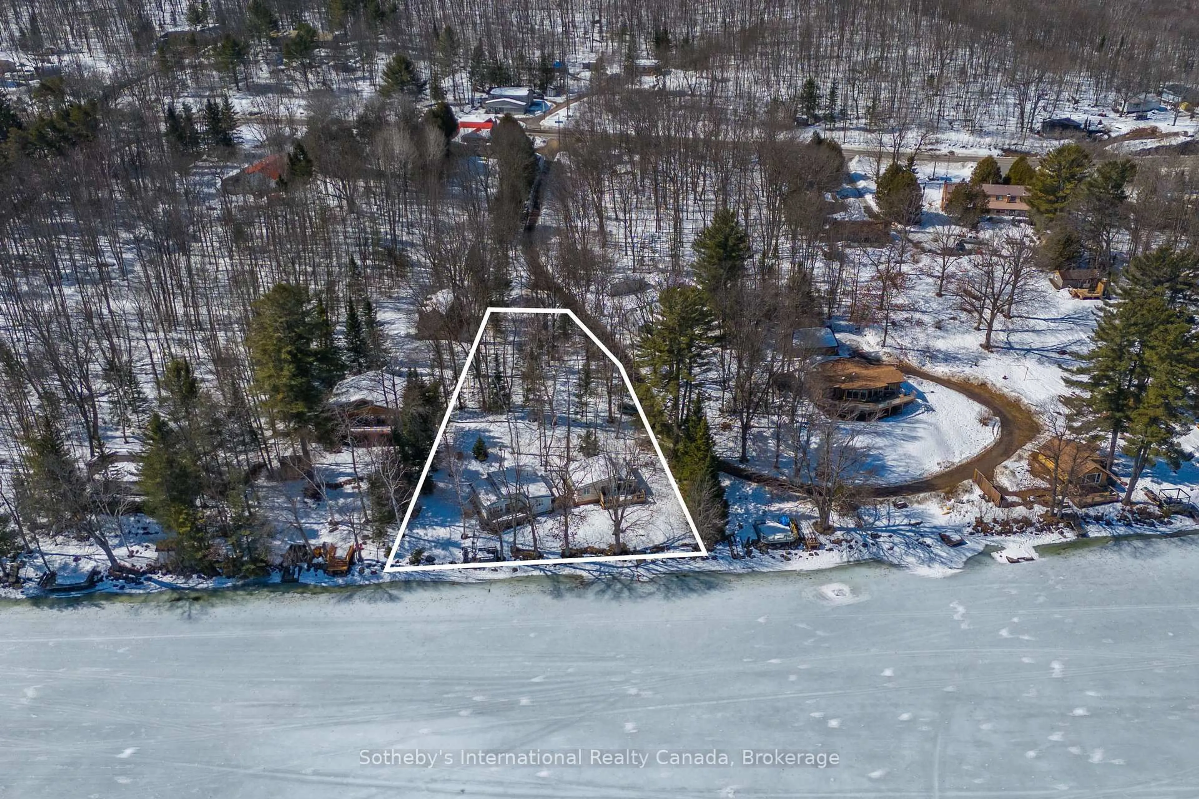 A pic from outside/outdoor area/front of a property/back of a property/a pic from drone, water/lake/river/ocean view for 1028 Hillcrest Lane, Algonquin Highlands Ontario K0M 1S0