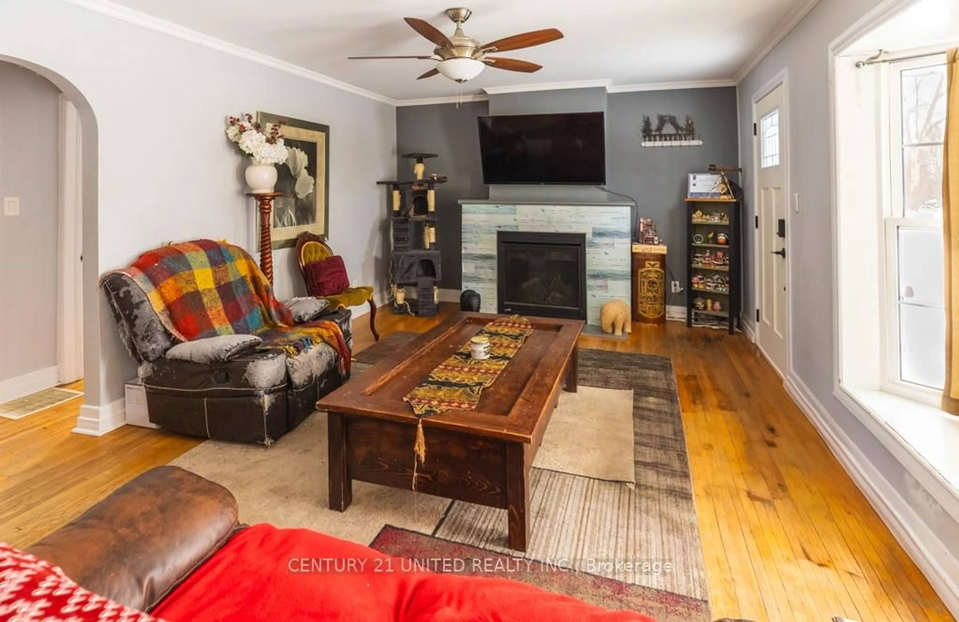 Living room with furniture, wood/laminate floor for 1009 Ward St, Smith-Ennismore-Lakefield Ontario K0L 1H0