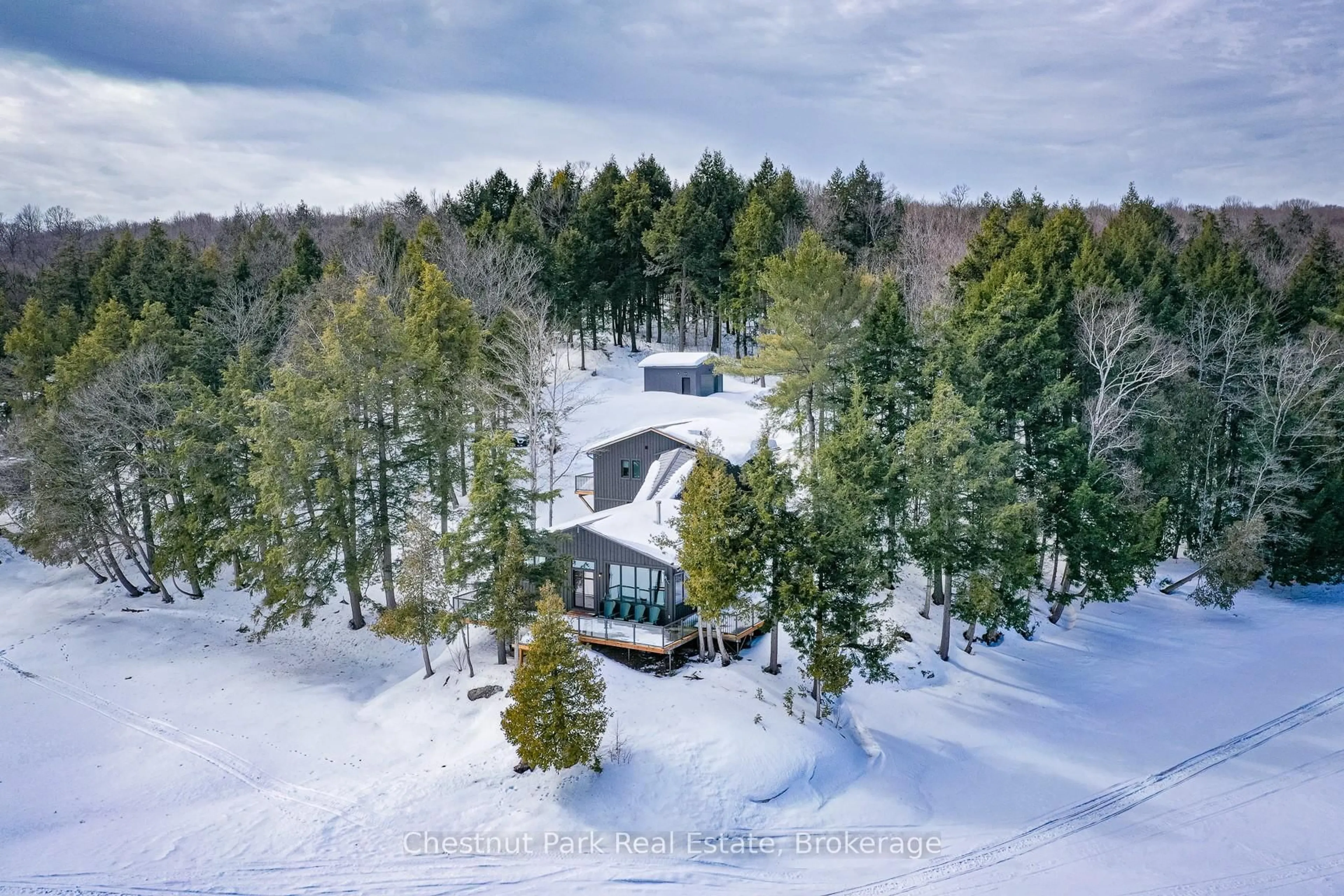 A pic from outside/outdoor area/front of a property/back of a property/a pic from drone, forest/trees view for 2438 Kushog Lake Rd, Algonquin Highlands Ontario K0M 1J1