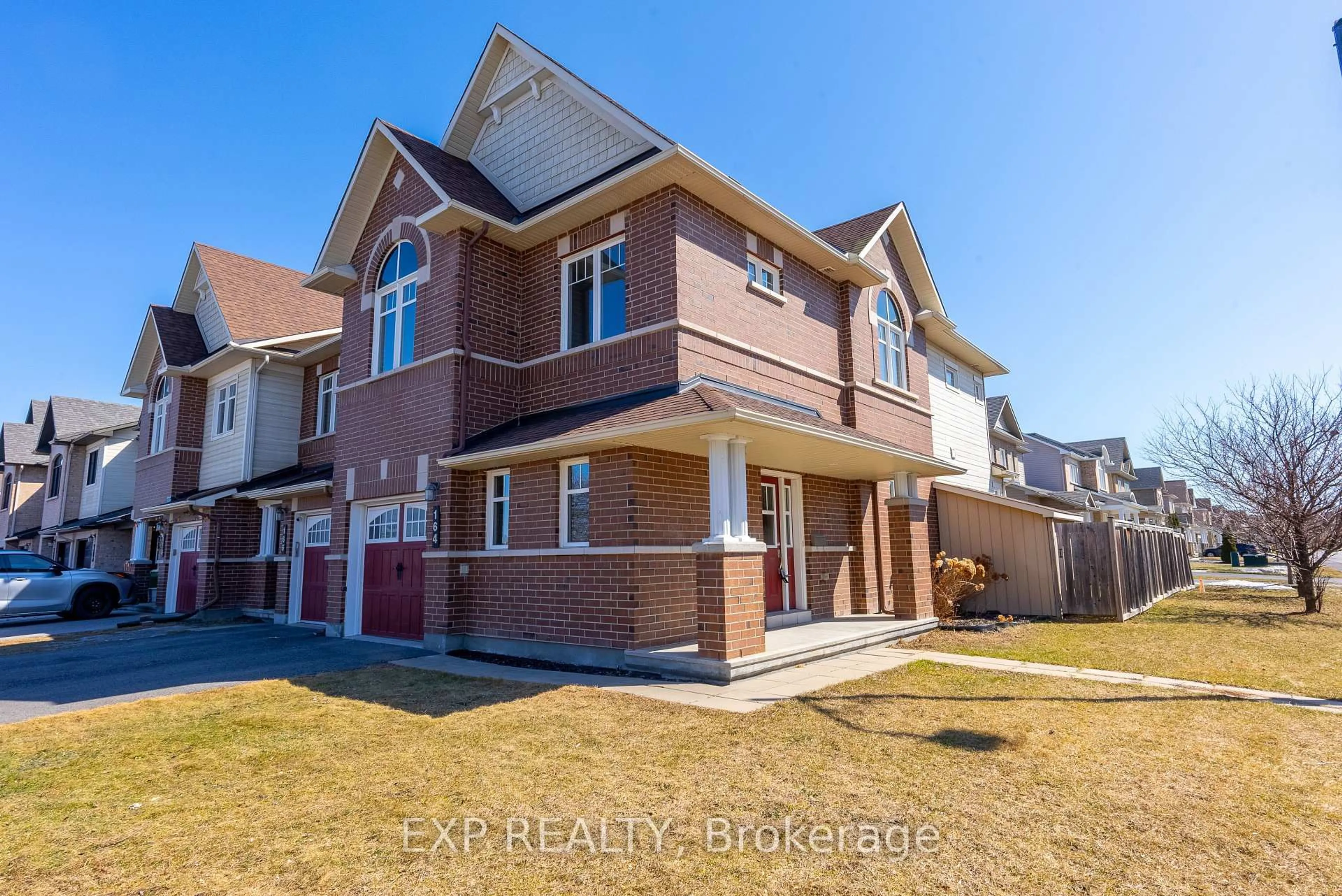 Home with brick exterior material, street for 164 Calvington Ave, Ottawa Ontario K2T 0H8