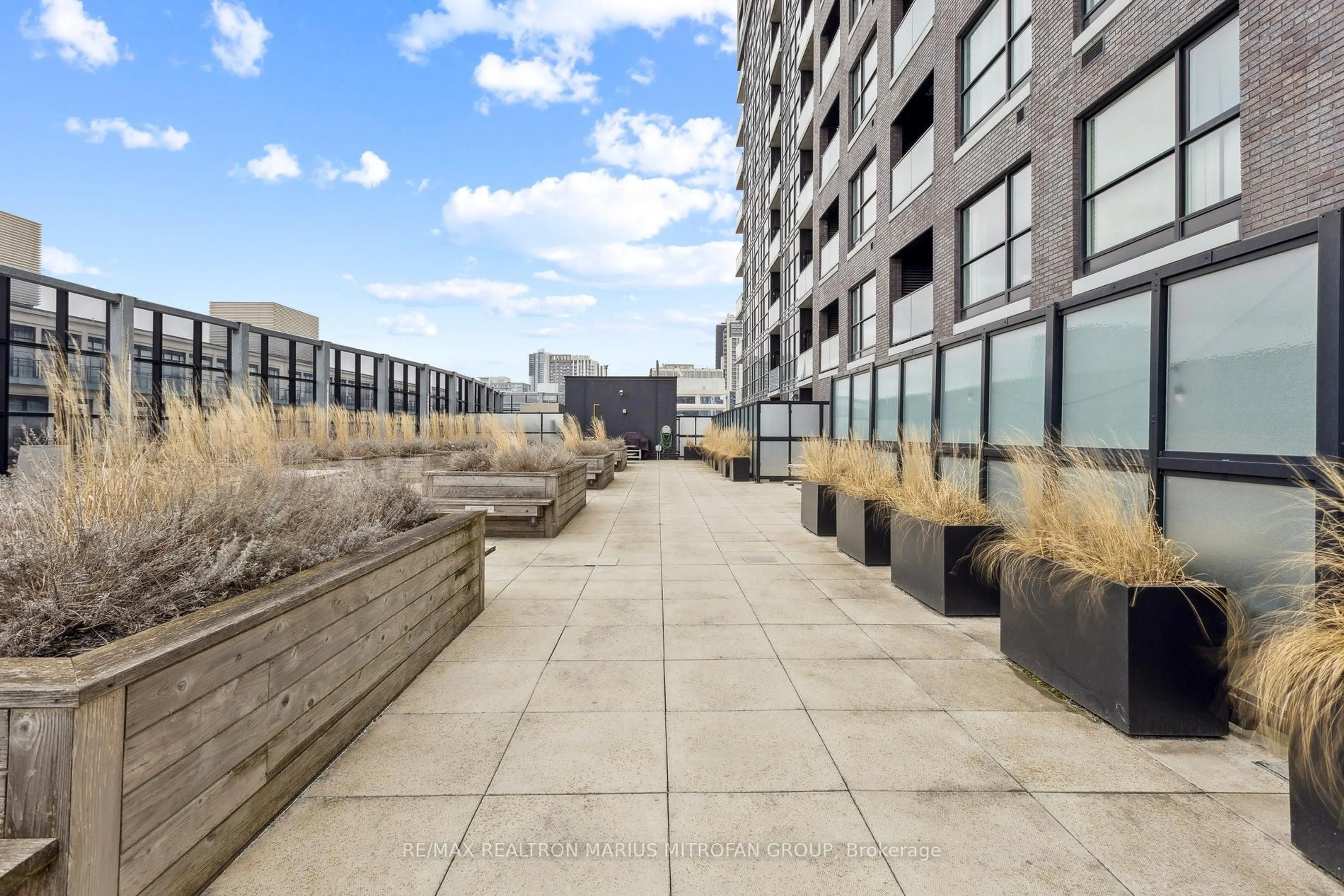 Patio, city buildings view from balcony for 1 Victoria St #613, Kitchener Ontario N2G 0B5