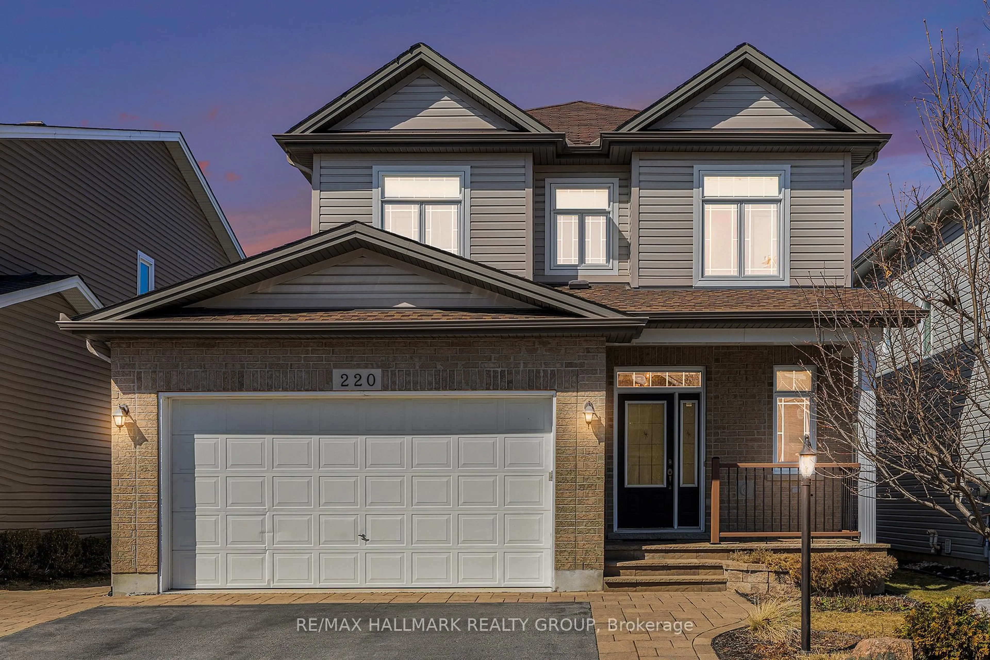 Home with vinyl exterior material, street for 220 Celtic Ridge Cres, Ottawa Ontario K2W 0C1