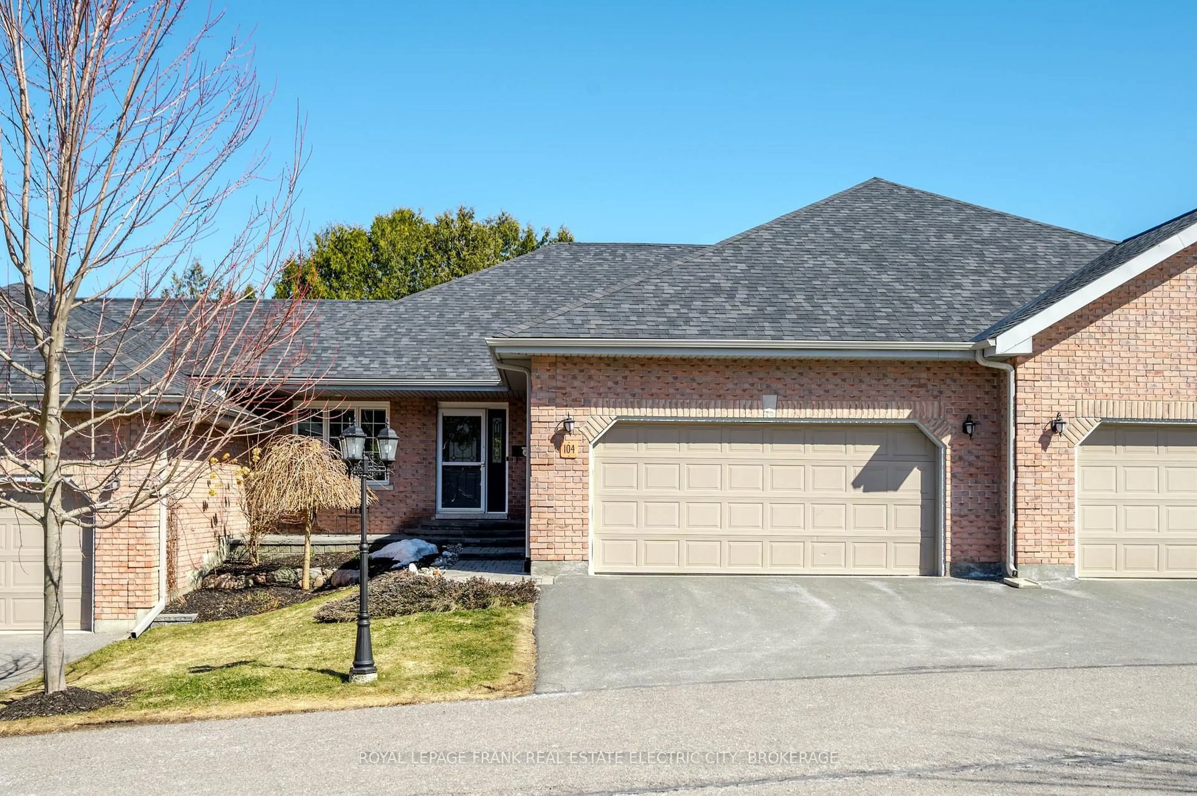 Home with brick exterior material, street for 1742 Ravenwood Dr #104, Peterborough West Ontario K9J 6N4