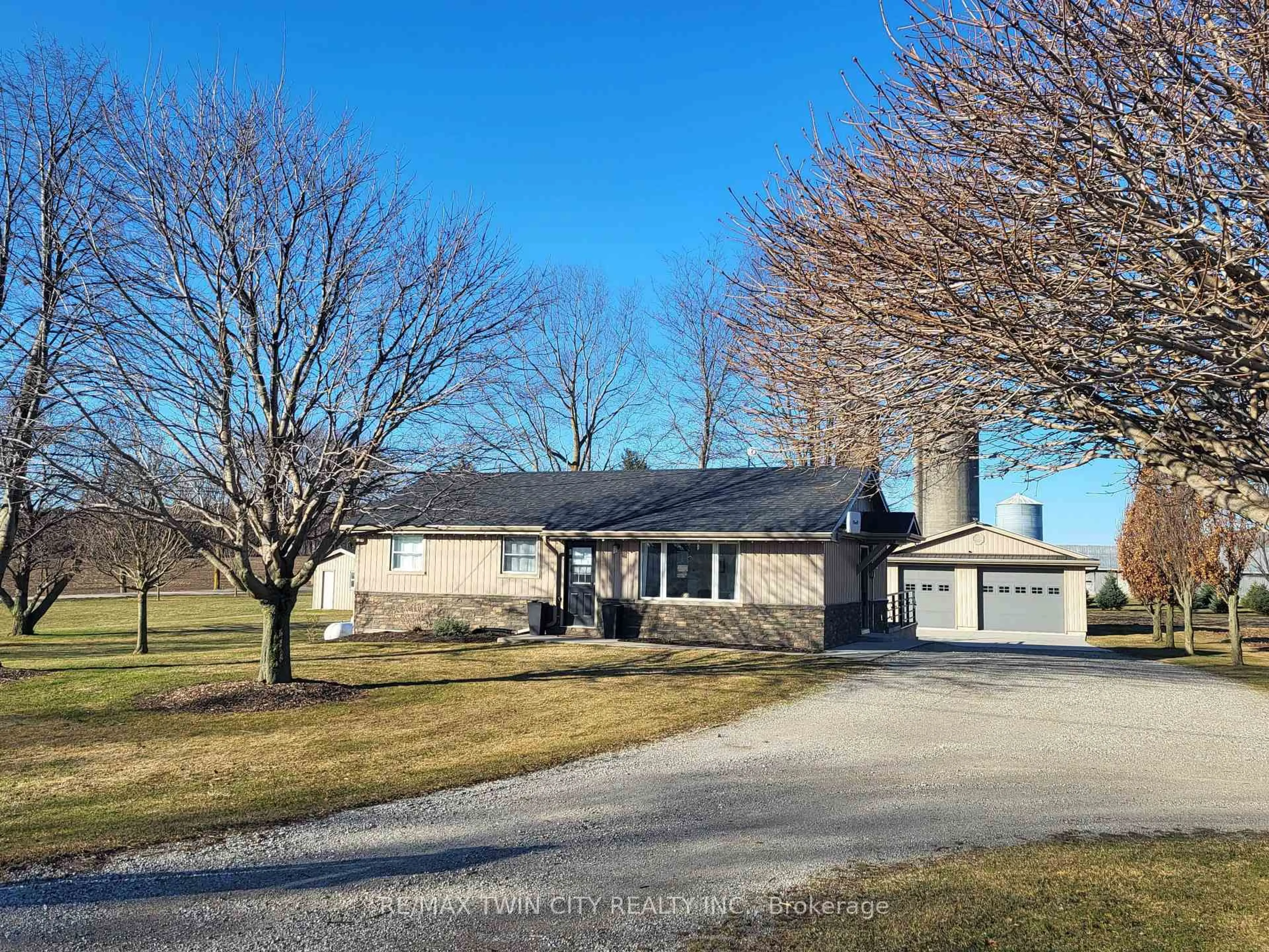 A pic from outside/outdoor area/front of a property/back of a property/a pic from drone, street for 596957 59 Highway, East Zorra-Tavistock Ontario N4S 7W1