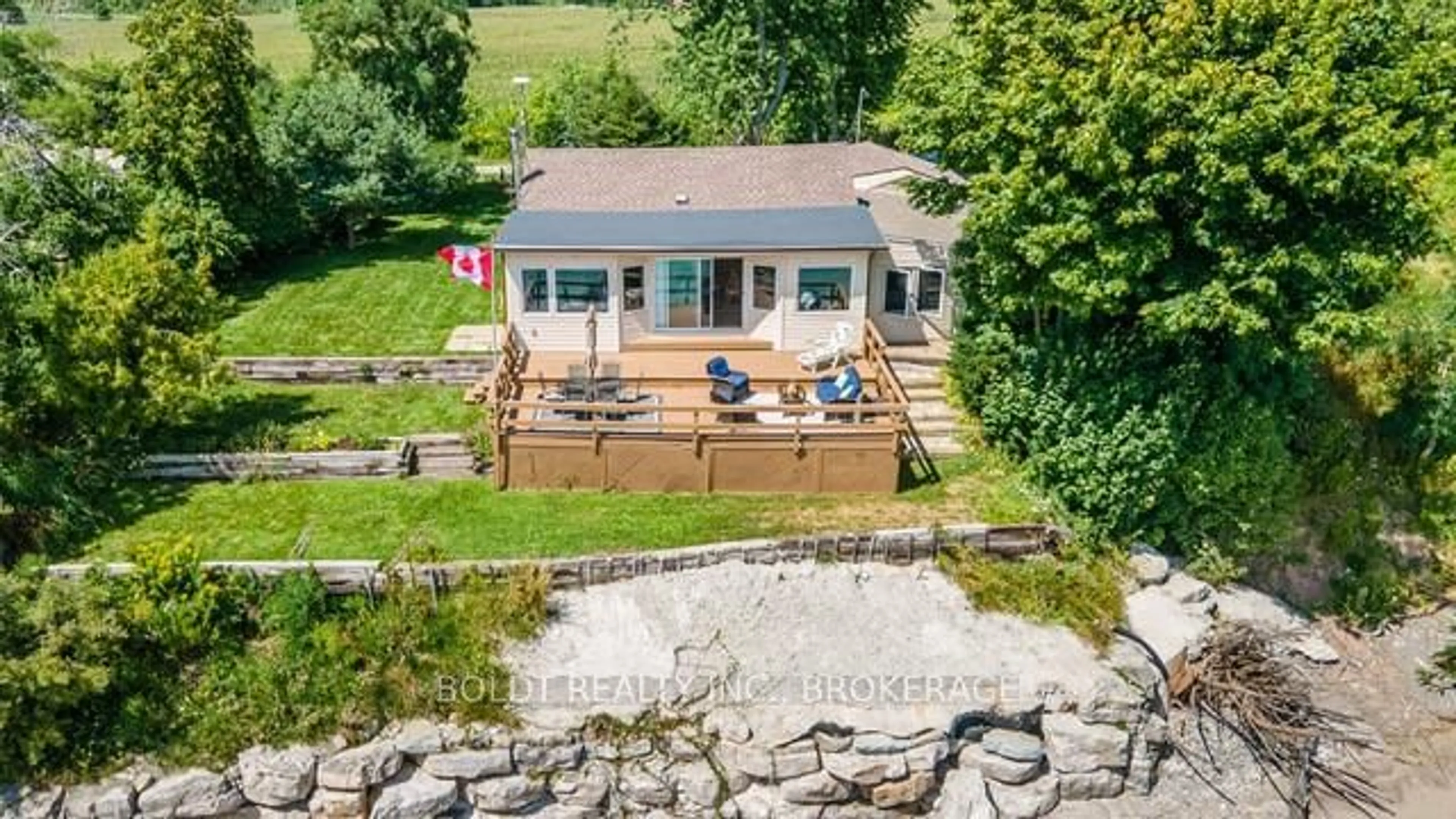 A pic from outside/outdoor area/front of a property/back of a property/a pic from drone, water/lake/river/ocean view for 47 Gull Line, Haldimand Ontario N0A 1K0
